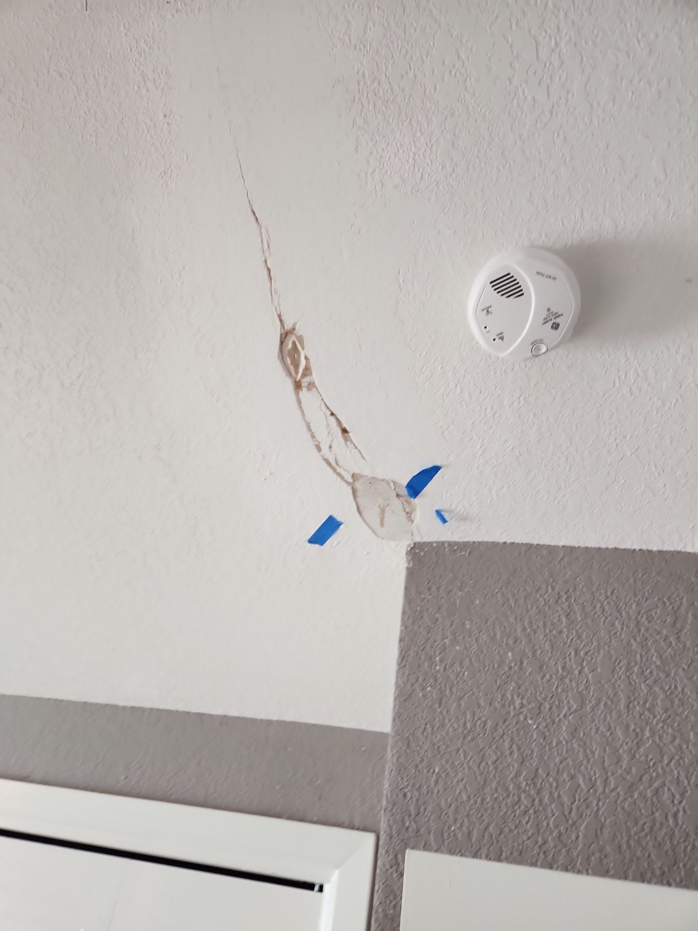 Drywall repair and door painting in S. Austin-78745 by RejuveNate Renovations LLC