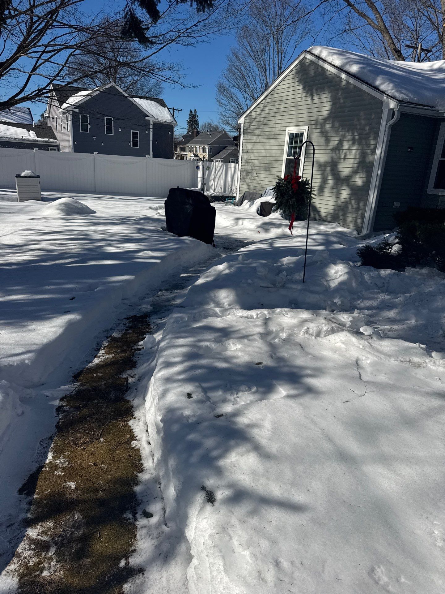 Snow/Ice Belt & Ice Dam Removal Project in Woburn by Mighty Dog Roofing of Greater Middlesex County
