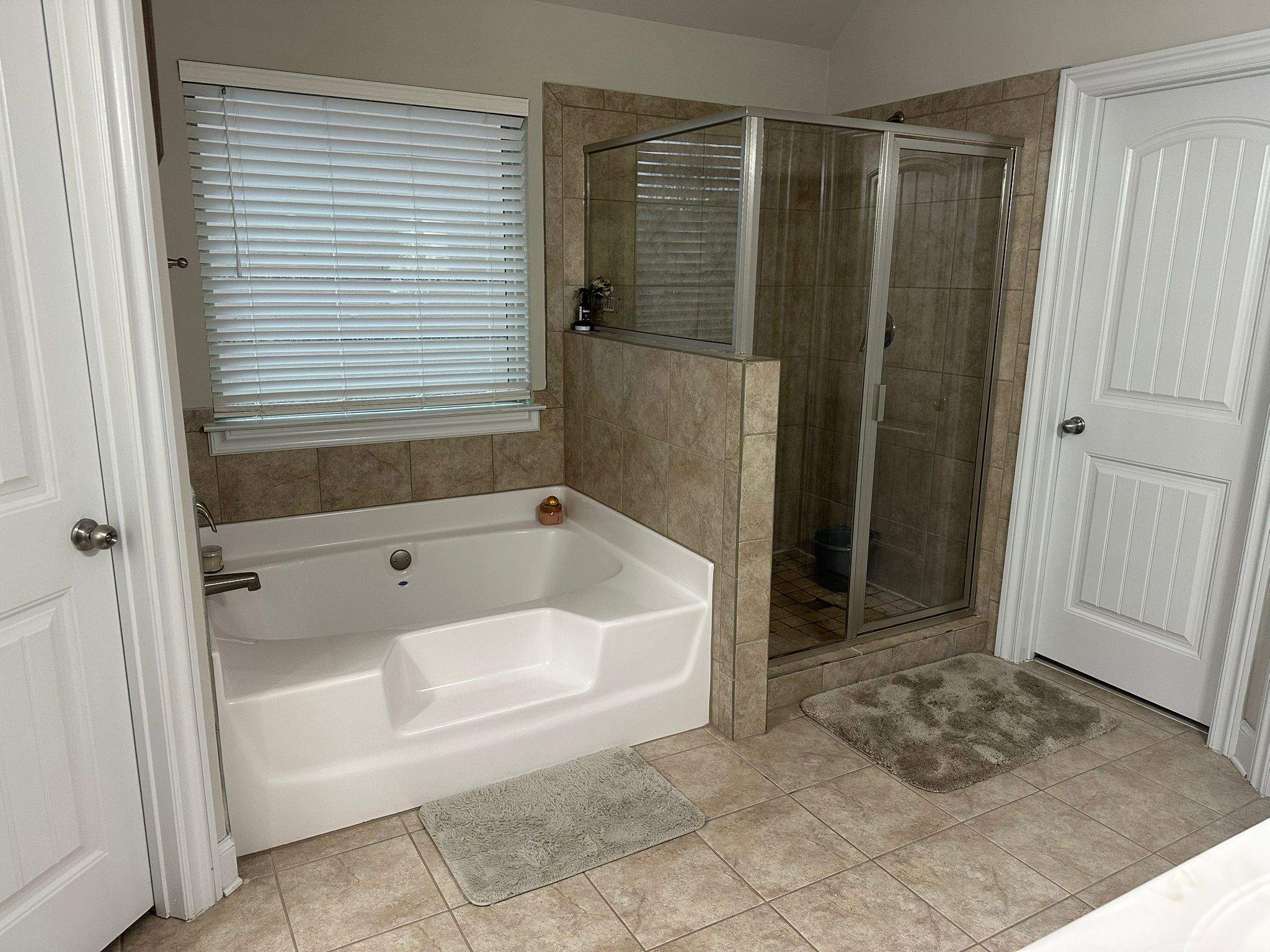 Shower retile and bathroom flooring by Prudencio