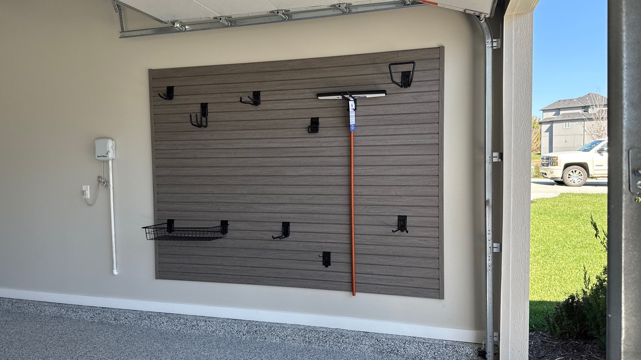 Rachael New Floor and Storage Makes All the Difference by Banner Garage