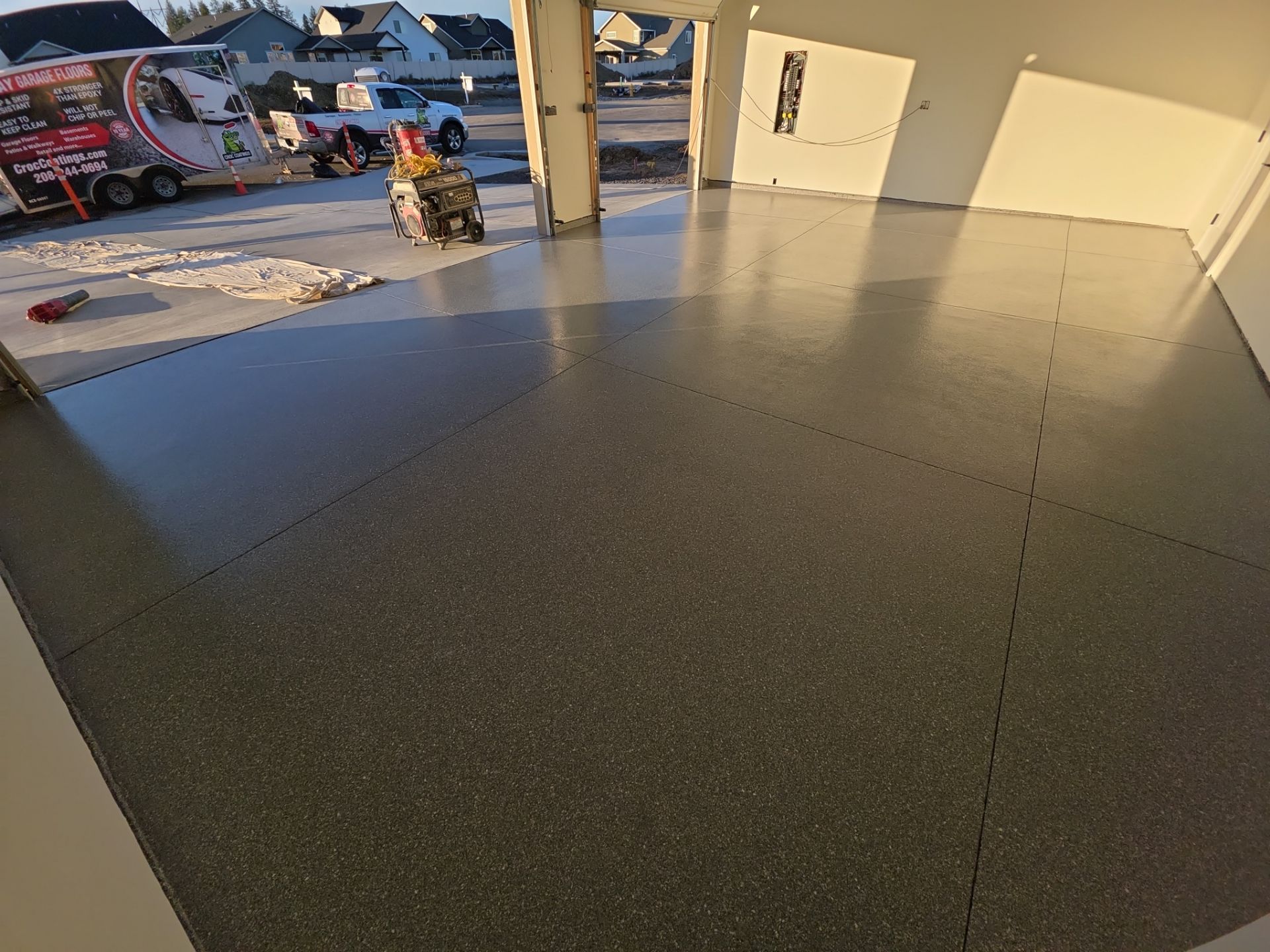 Garage Transformation using Turquoise Hybrid by Croc Coatings, LLC