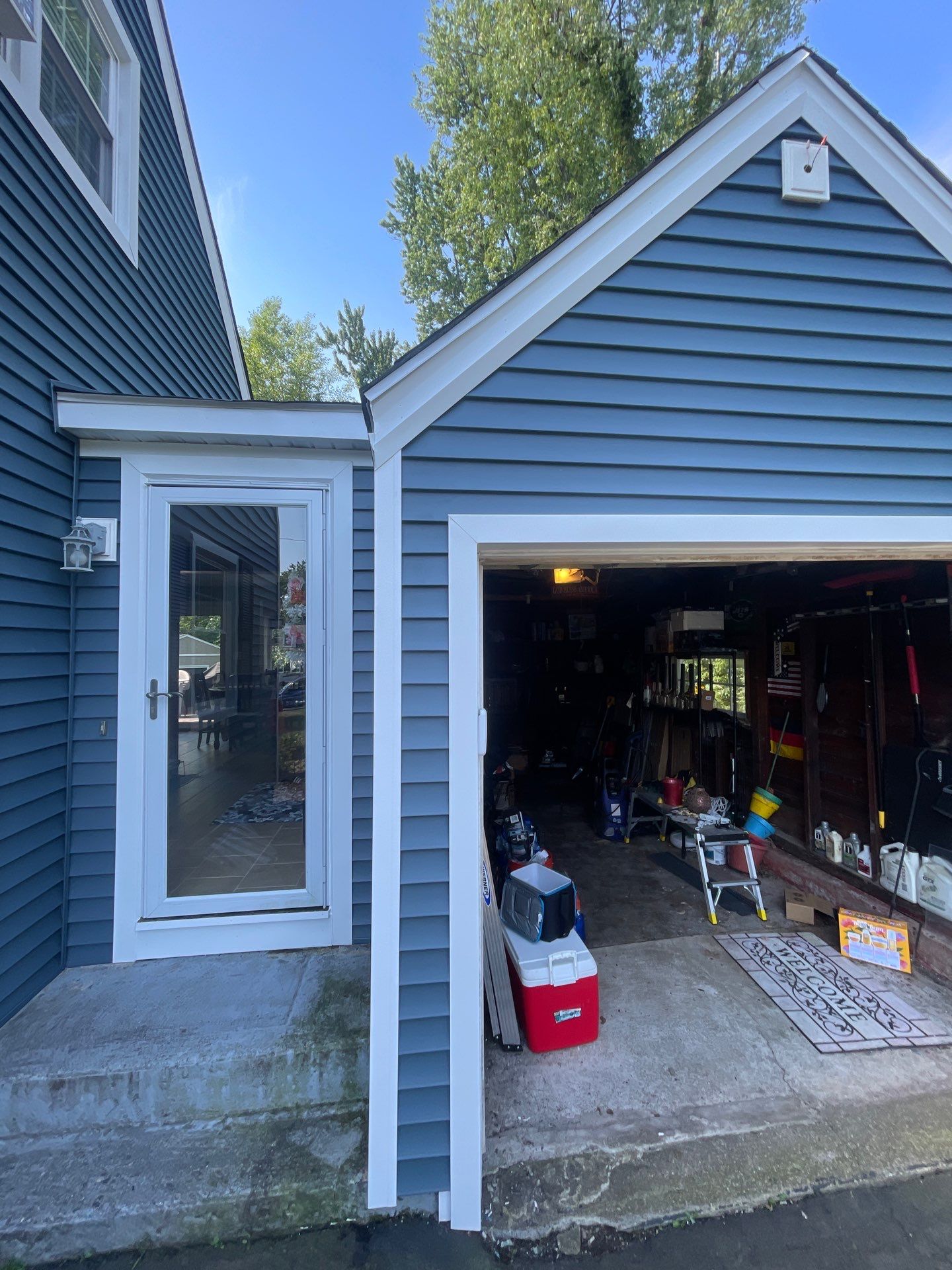 Complete Exterior Estate gray with Pacific Blue Siding by A Plus Exterior
