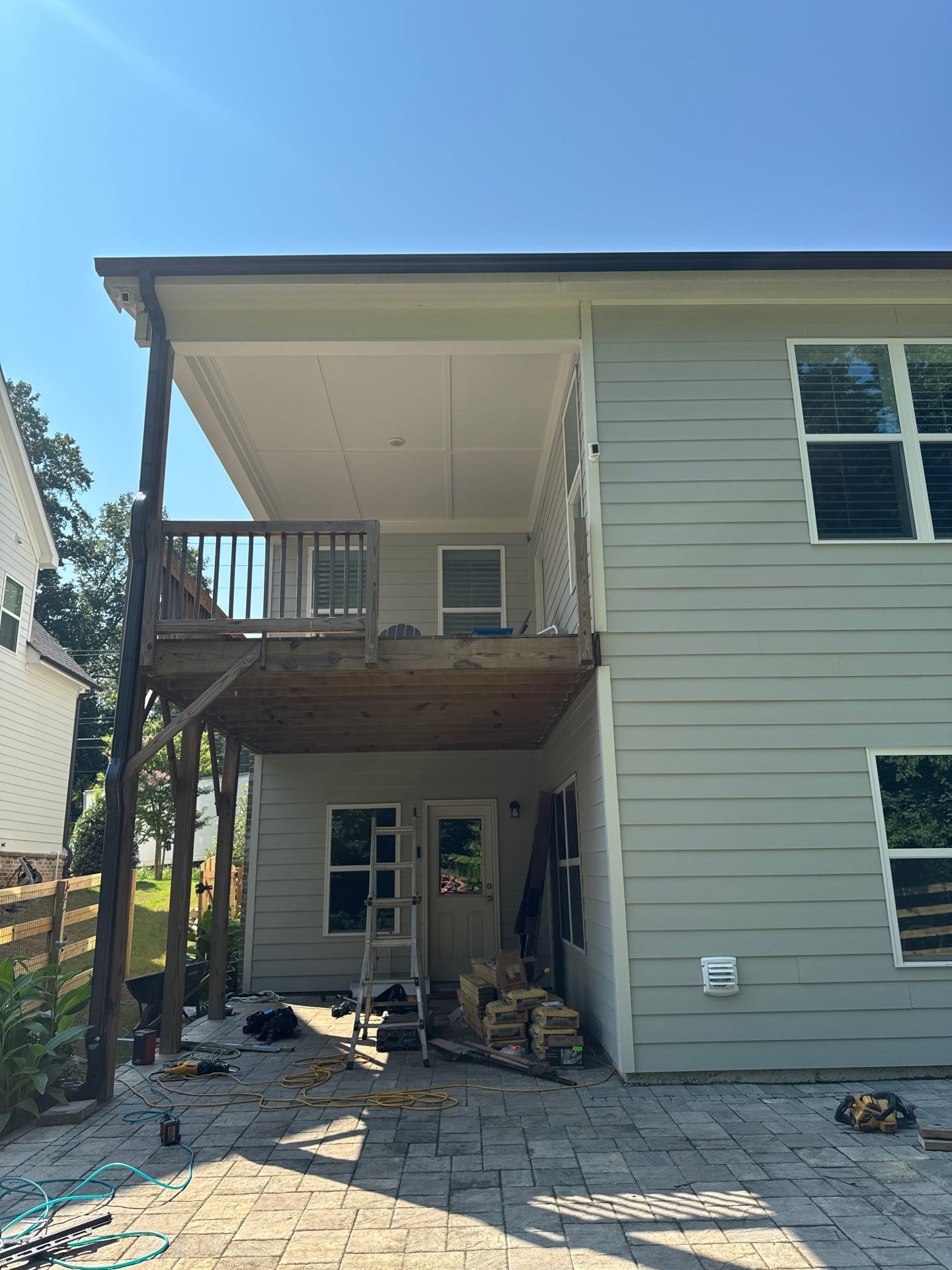 Elevated Deck Stair Construction and Paver Patio in Marietta by Swift Home Renovations
