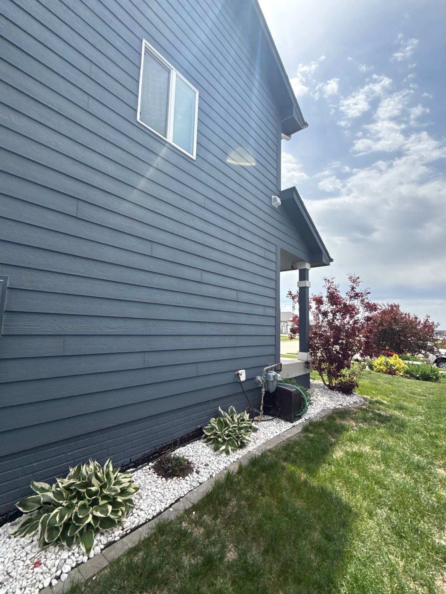 Residential Exterior Repaint in Ankeny by Midwest Paint LLC