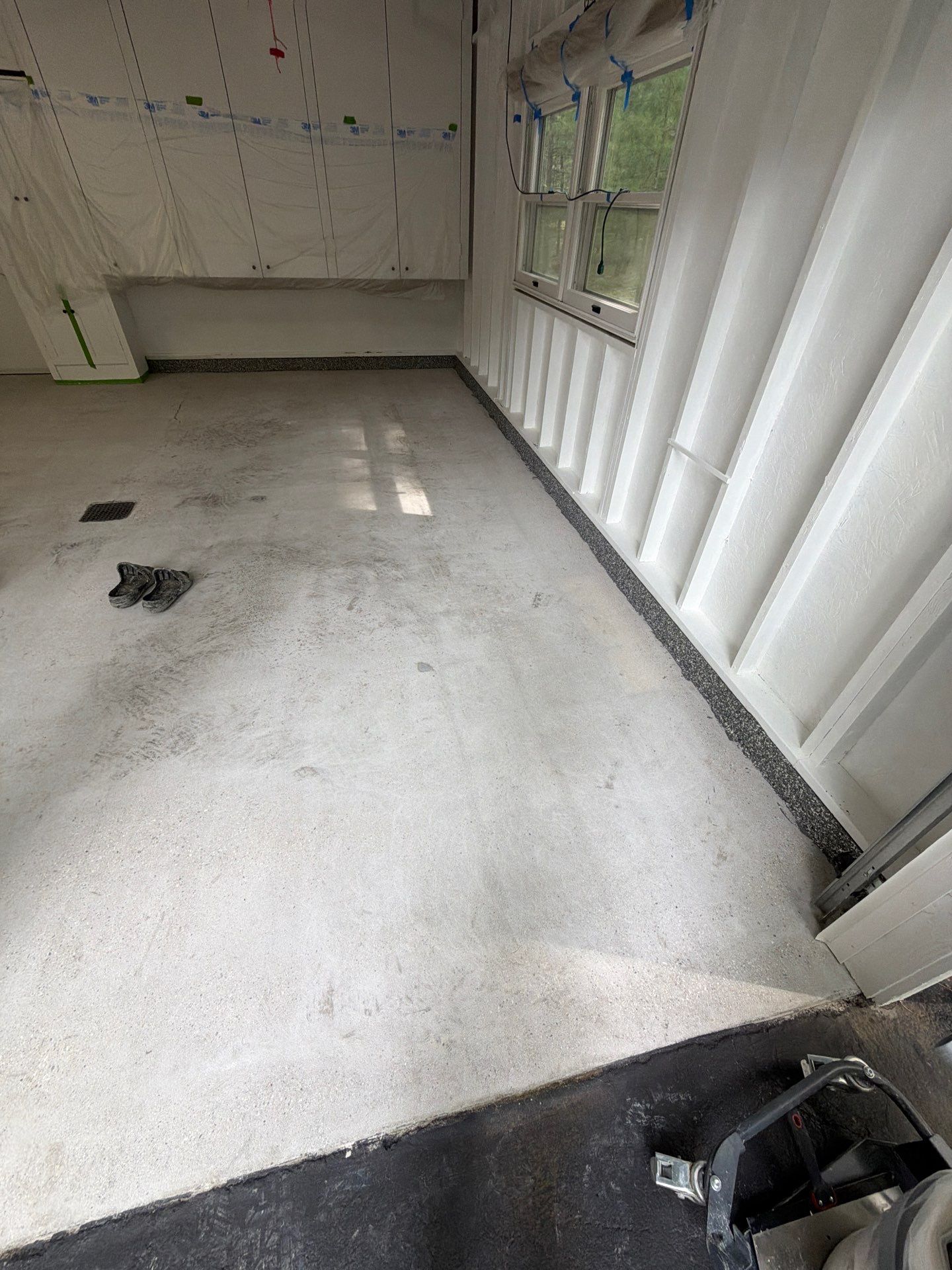 Pentwater Garage Epoxy Flake Floor Installation and Exterior Refinement by Gordon Painting