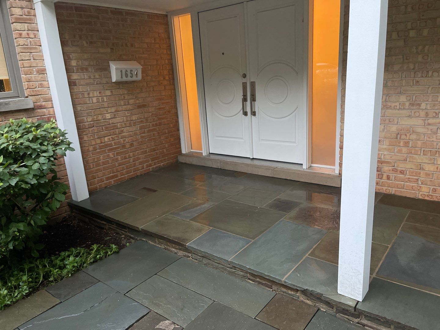 Bluestone patio cleaning by Northern Power Washing LLC.