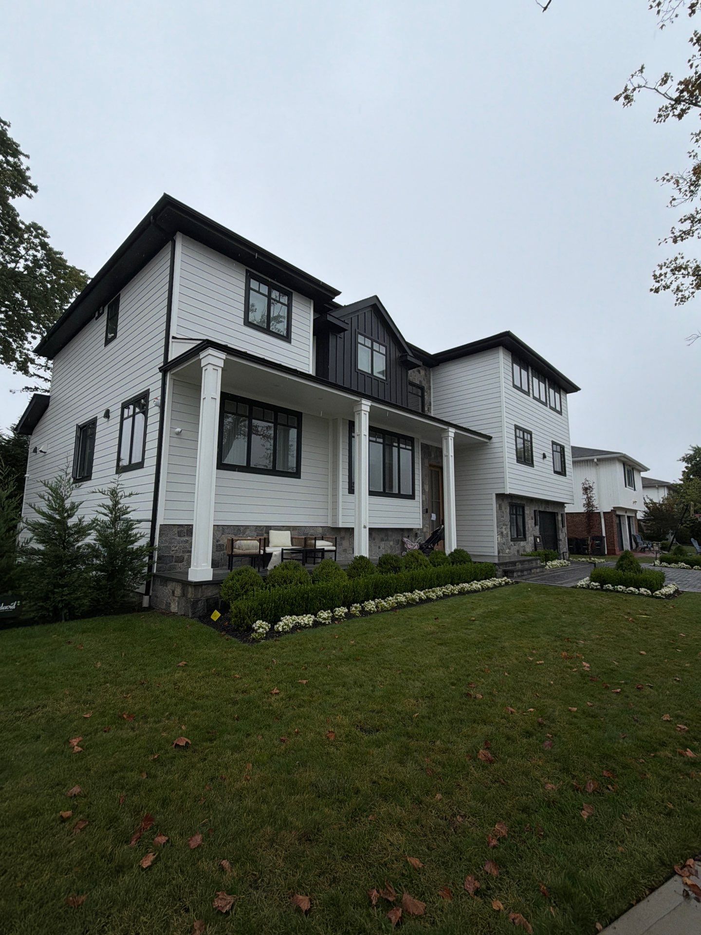 Gutter Cleaning N Woodmere by Above All Gutters