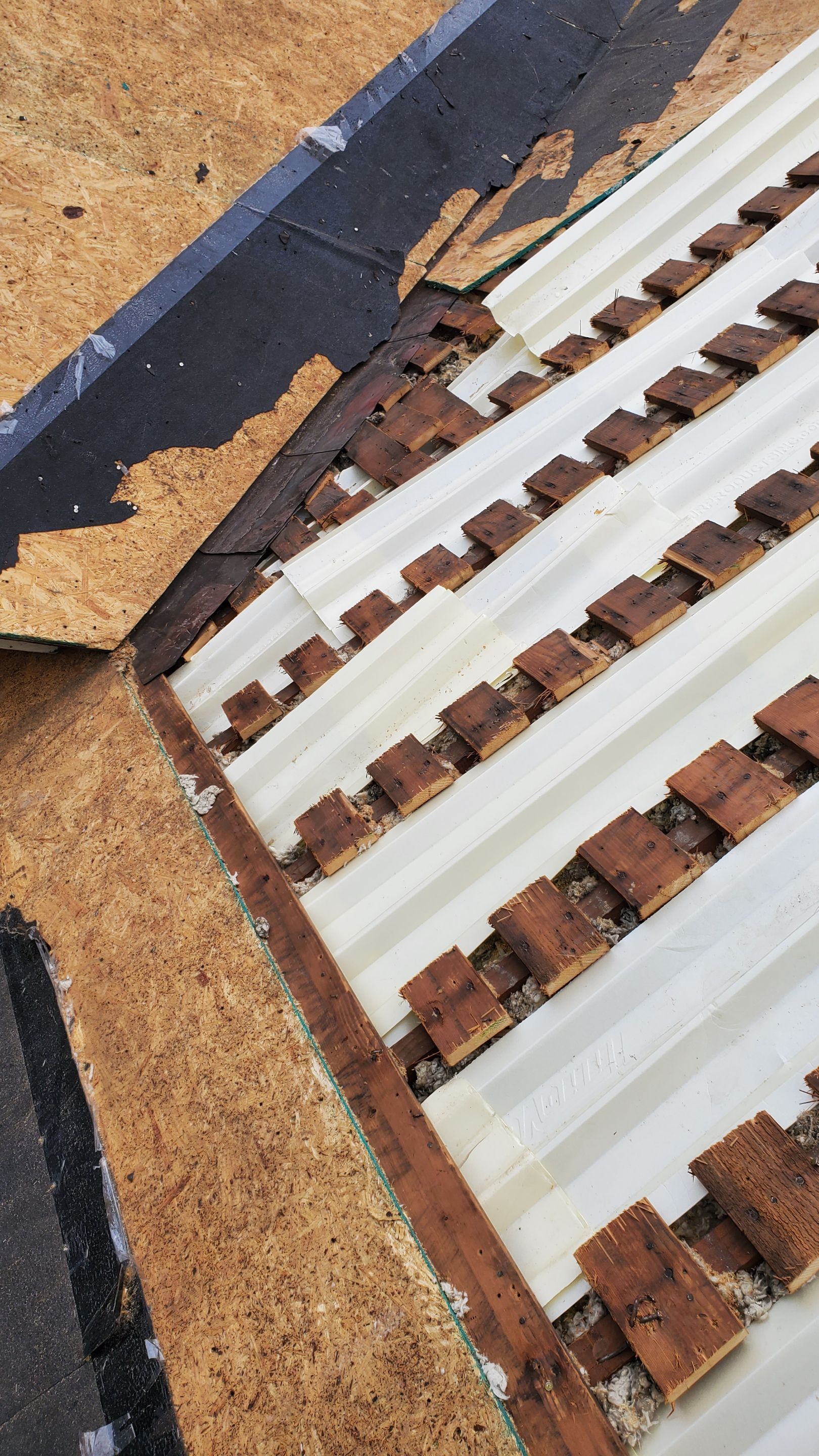 Residential Roofing Installation using Owens Corning inFlow Vent by Absolute Roofing and Construction