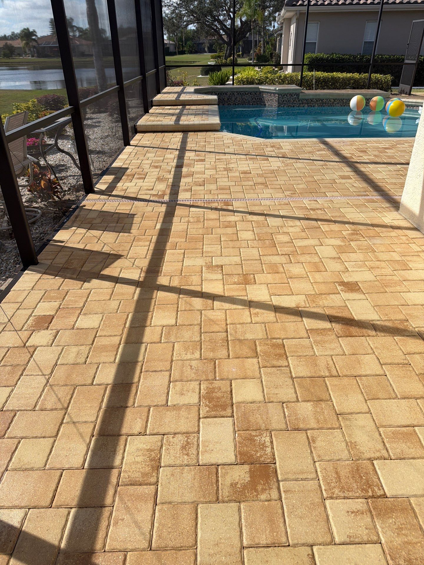 Custom Tan Paver Pool Deck and Patio in Sun City Center by Supreme Paver Experts