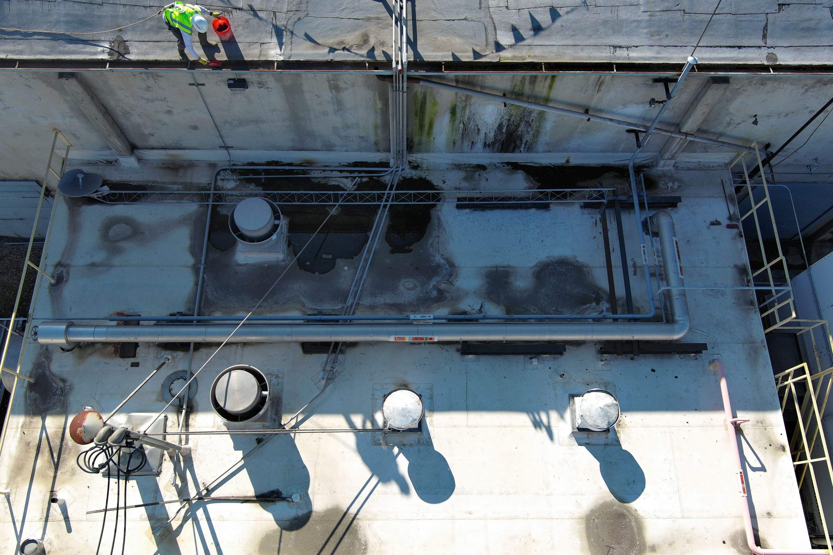 TPO single-ply roofing system using GAF Single-ply TPO 60 mil with 1.5 inch ISO board insulation by Straight Edge Roofing Inc