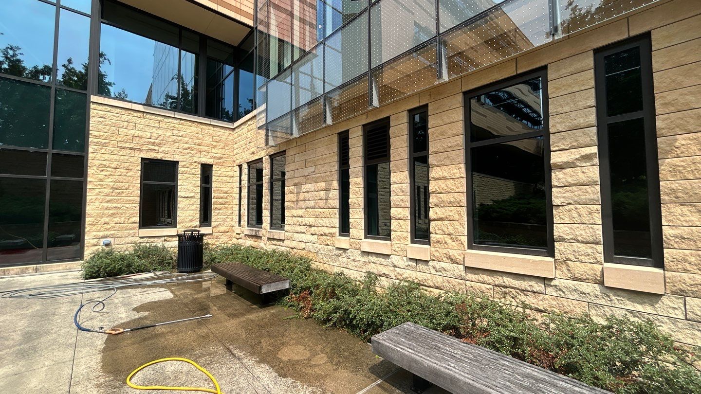 natural stone using Algaecide, soft wash soap by Northern Power Washing LLC.