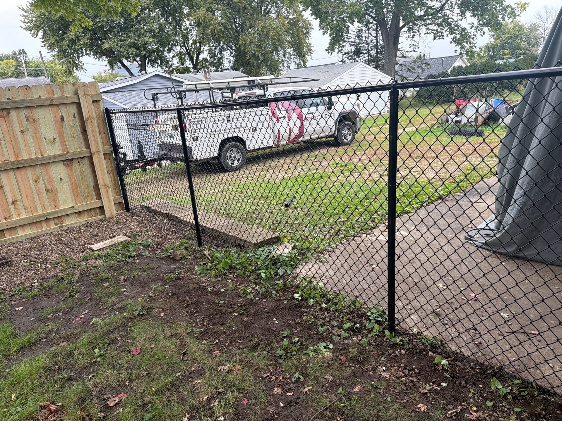 Custom Wood Privacy and Black Chain Link Fence in Hudson by Perfect Picket Fence and Stain
