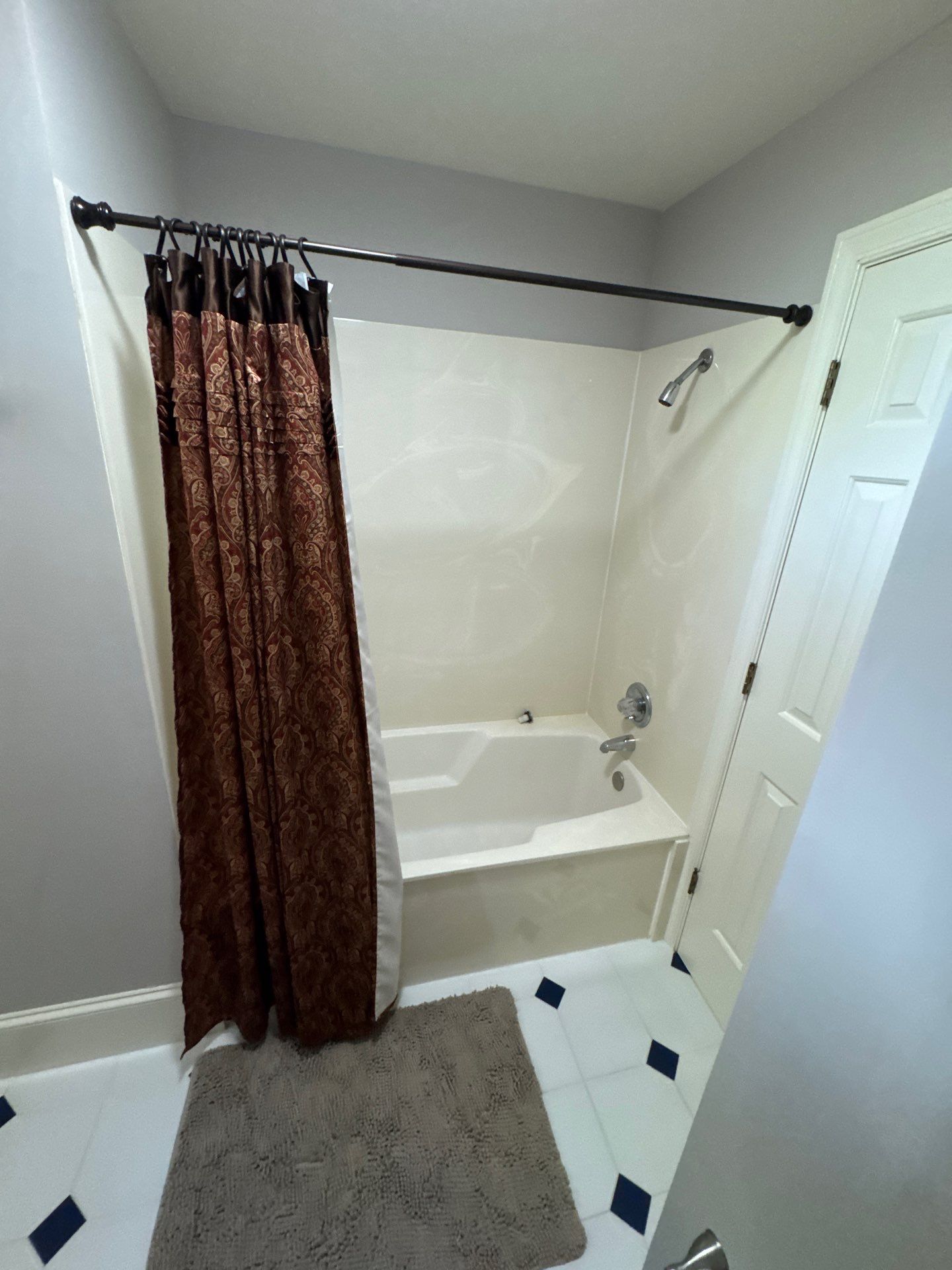 Tub to walk-in shower conversion using Glass door by Prudencio