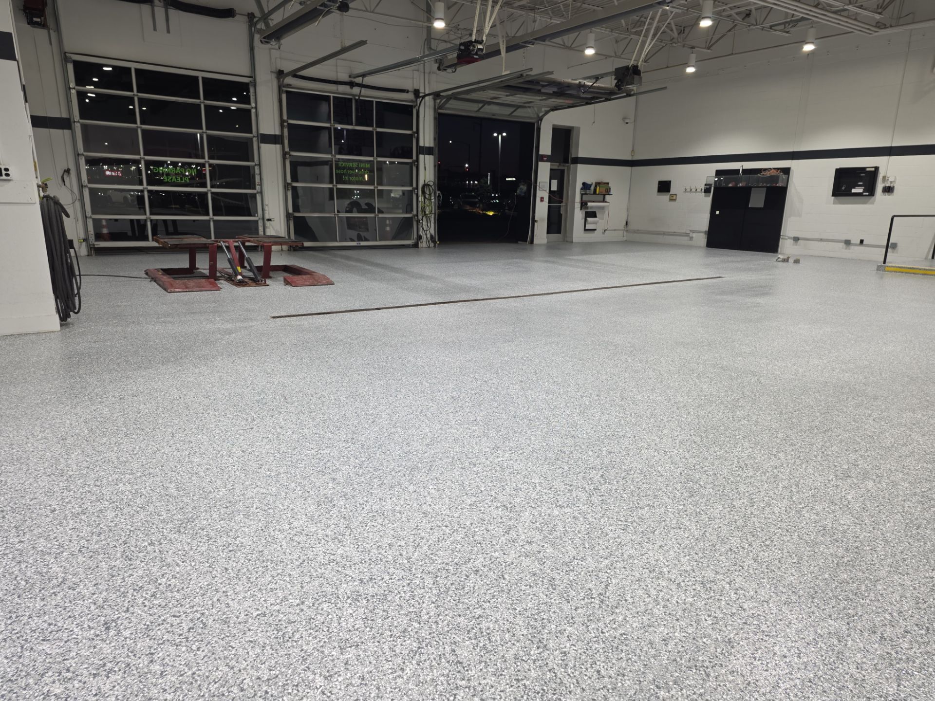 Mini Cooper Commercial Epoxy Floor Installation by Revival Concrete Coatings