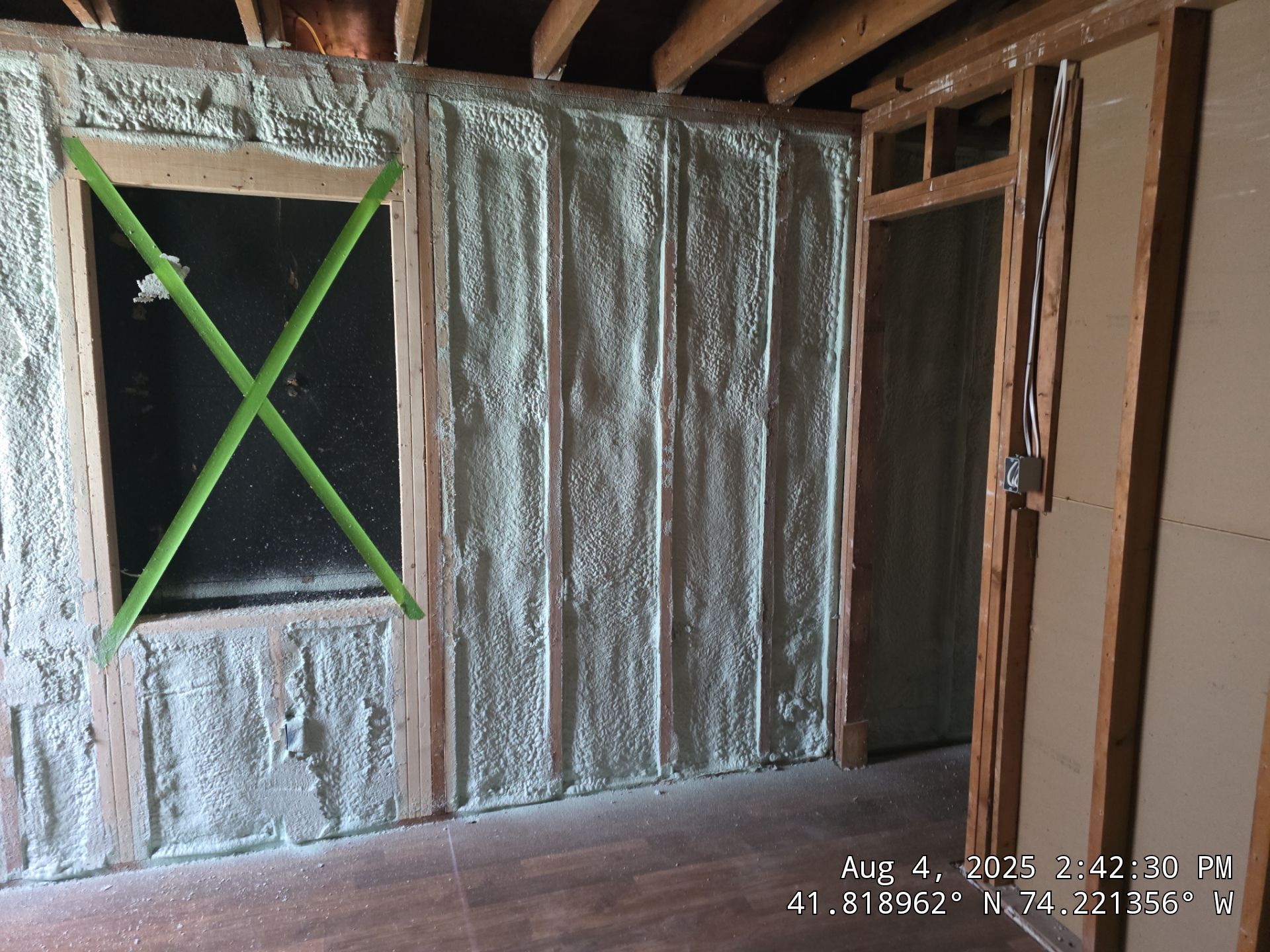 Master bedroom Exterior Walls using open cell spray foam by NYS Foam & Energy