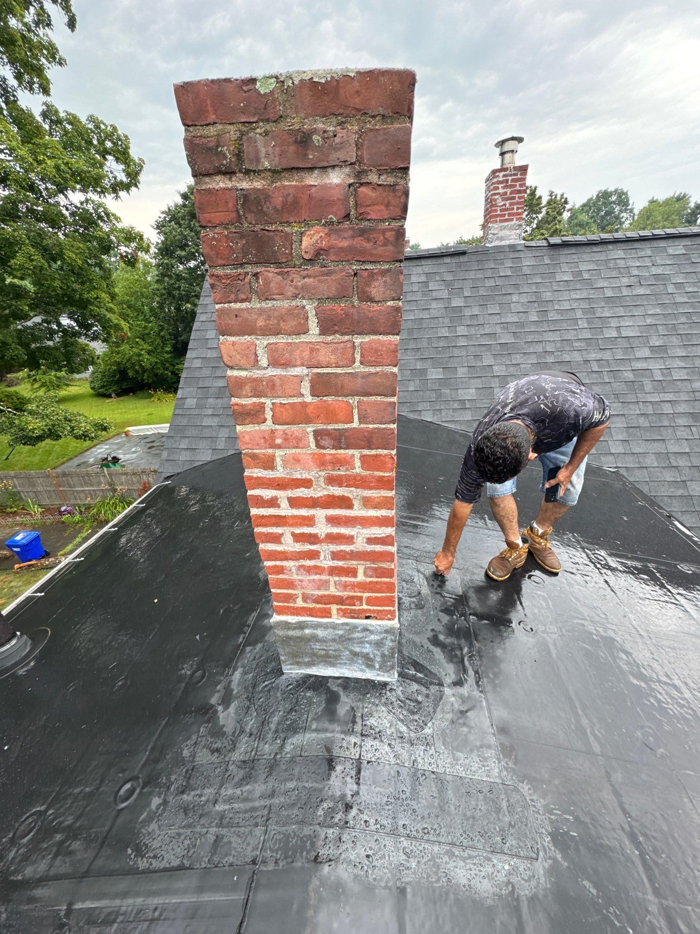 Full Roof Replacement + Custom Gutter Install | Onyx Black Finish by Mighty Dog Roofing of Greater Middlesex County