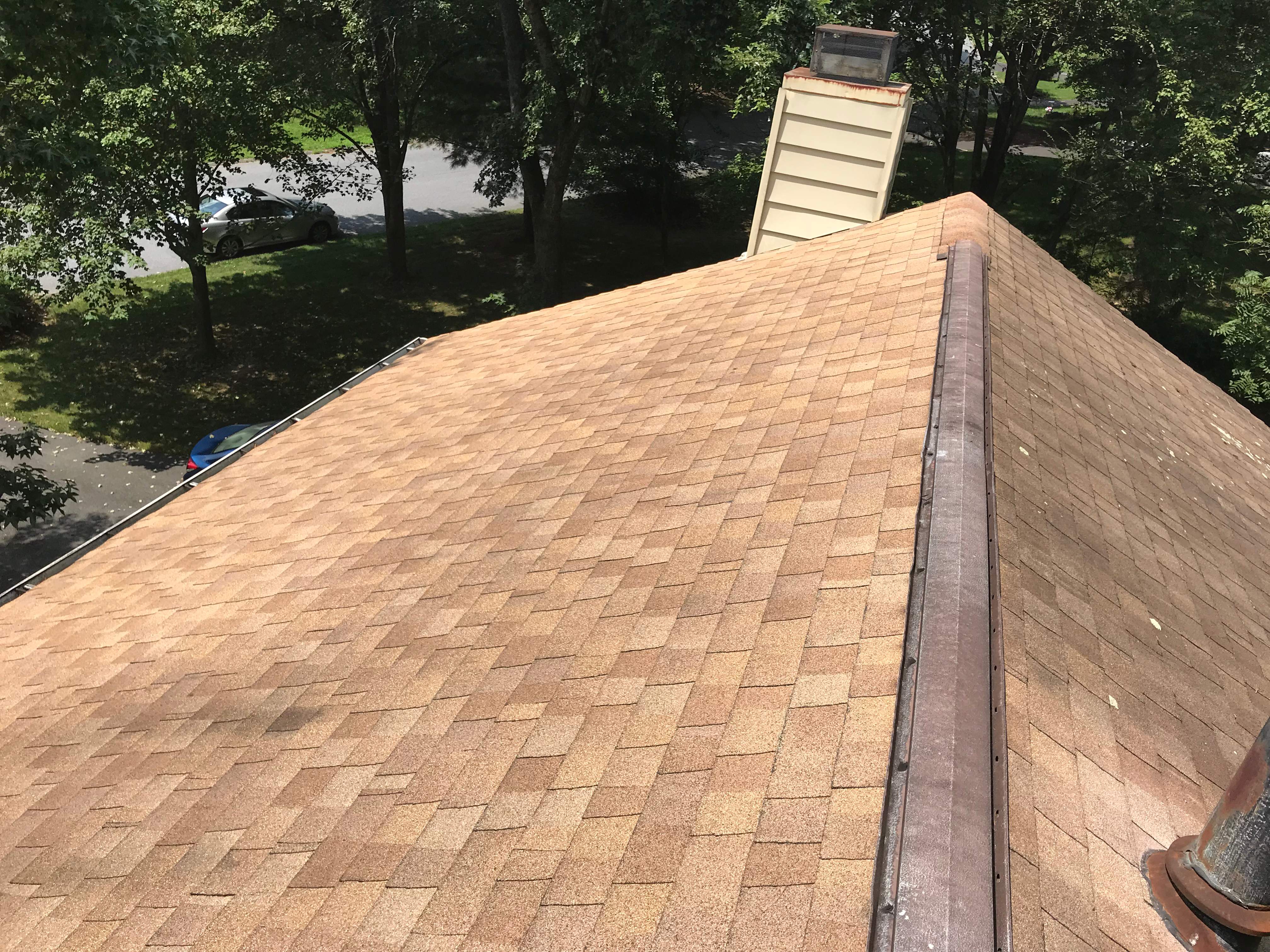 Residential Roofing Installation using Landmark Shingles Color Weatherwood by Alpha Design Services