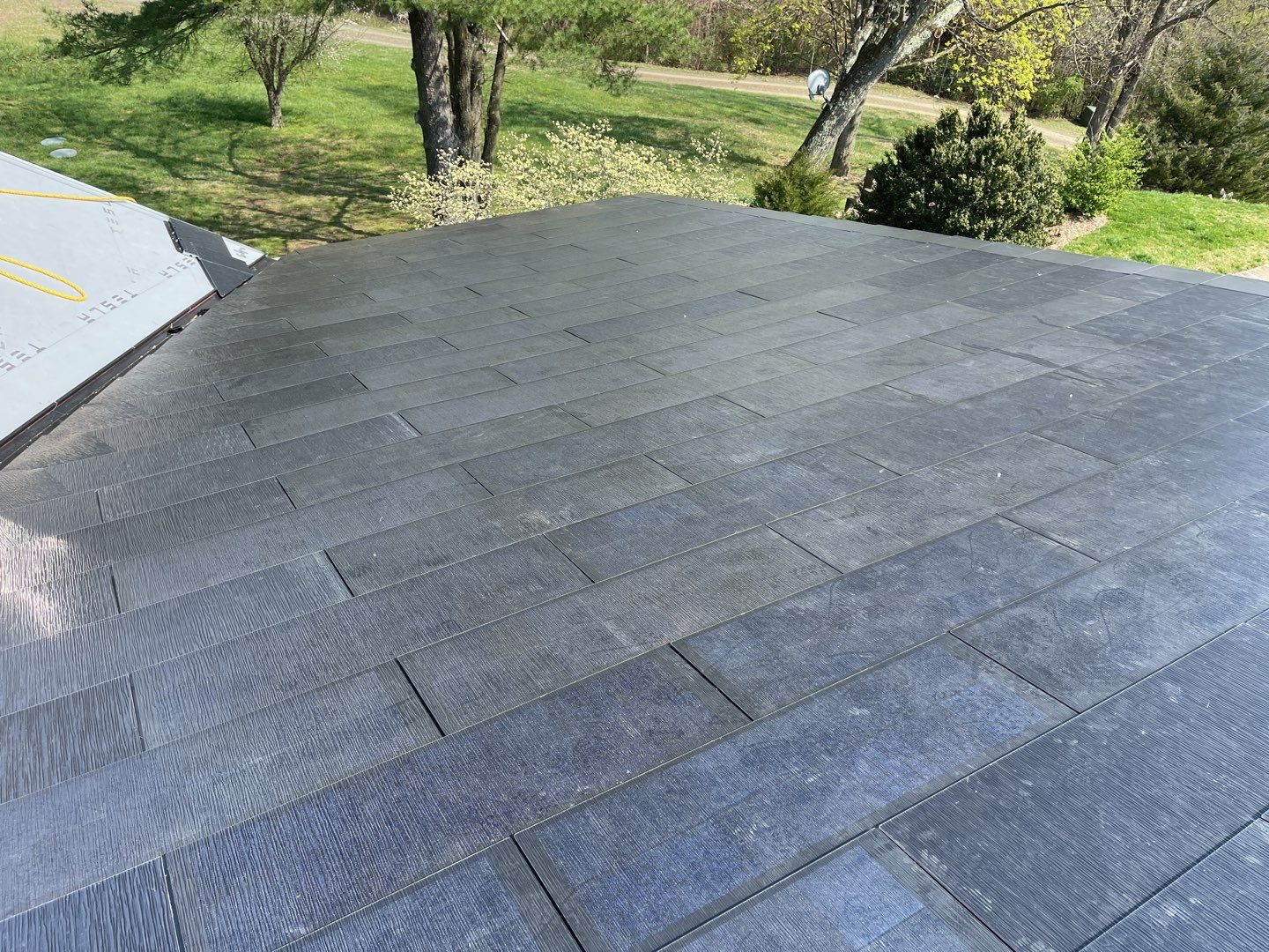 Tesla Solar Roof Replacement by American Home Contractors