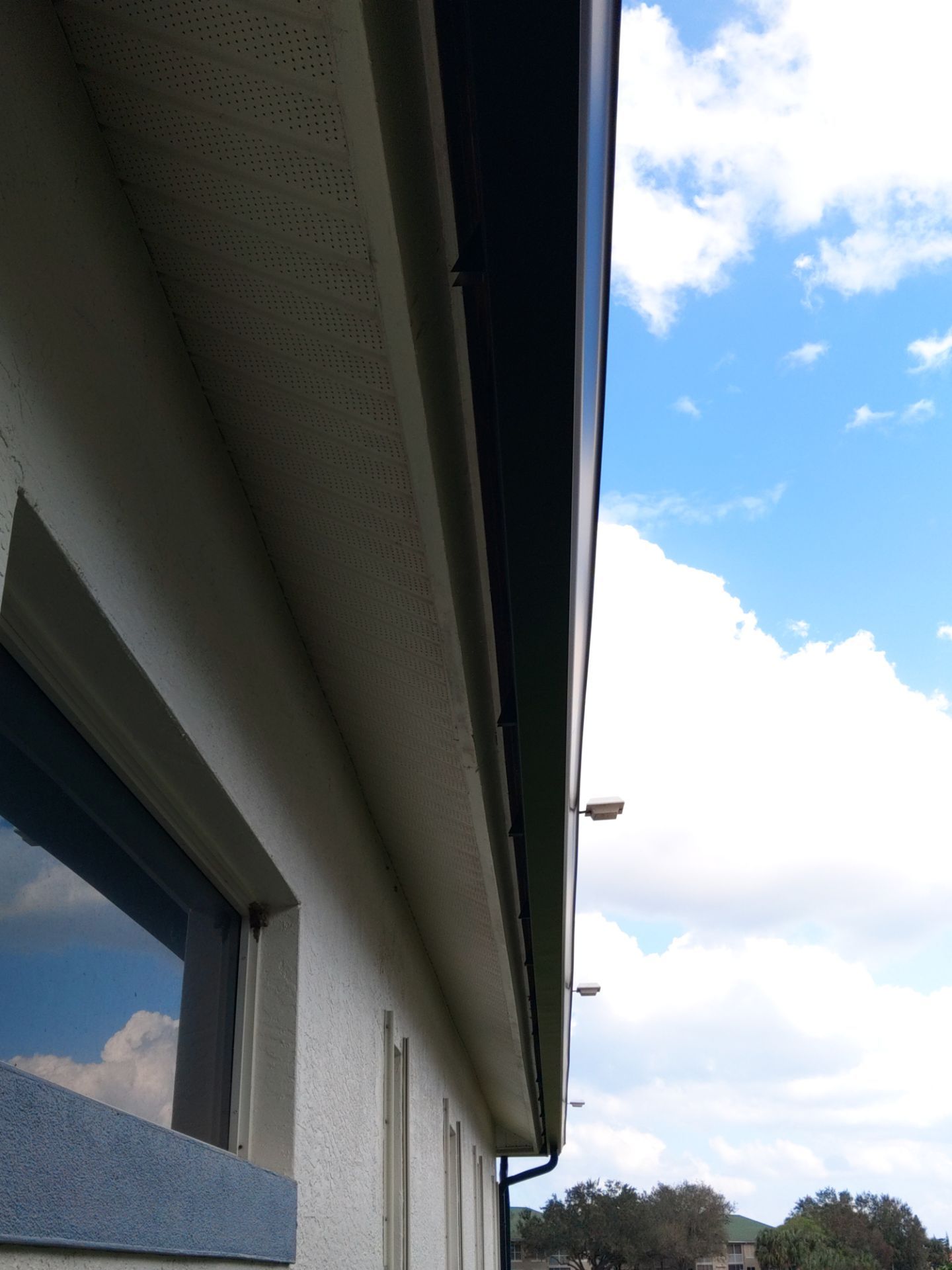 Black Seamless Gutters  by Gutter Professors