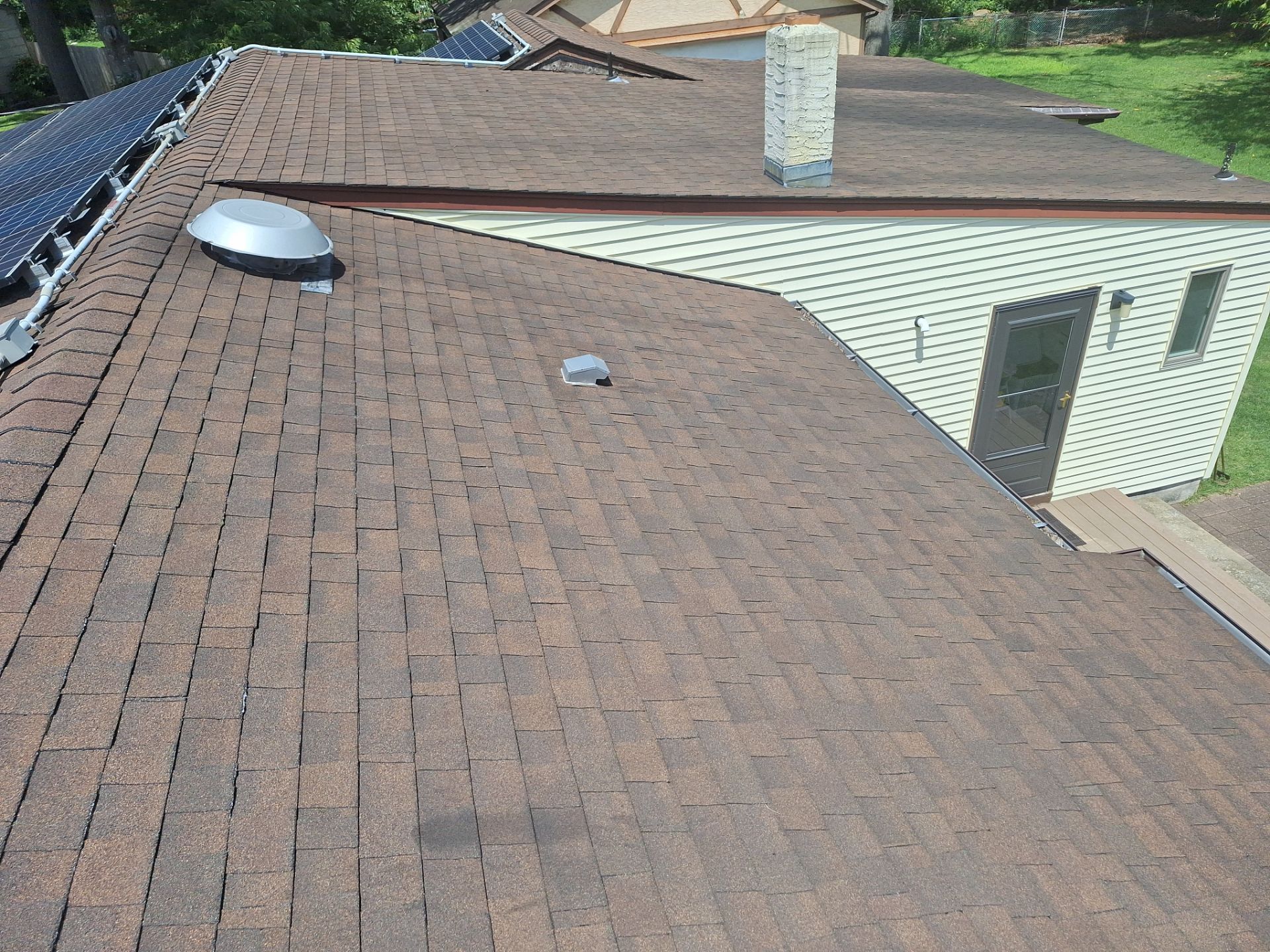 Brownwood Shingles by Reimagine Roofing