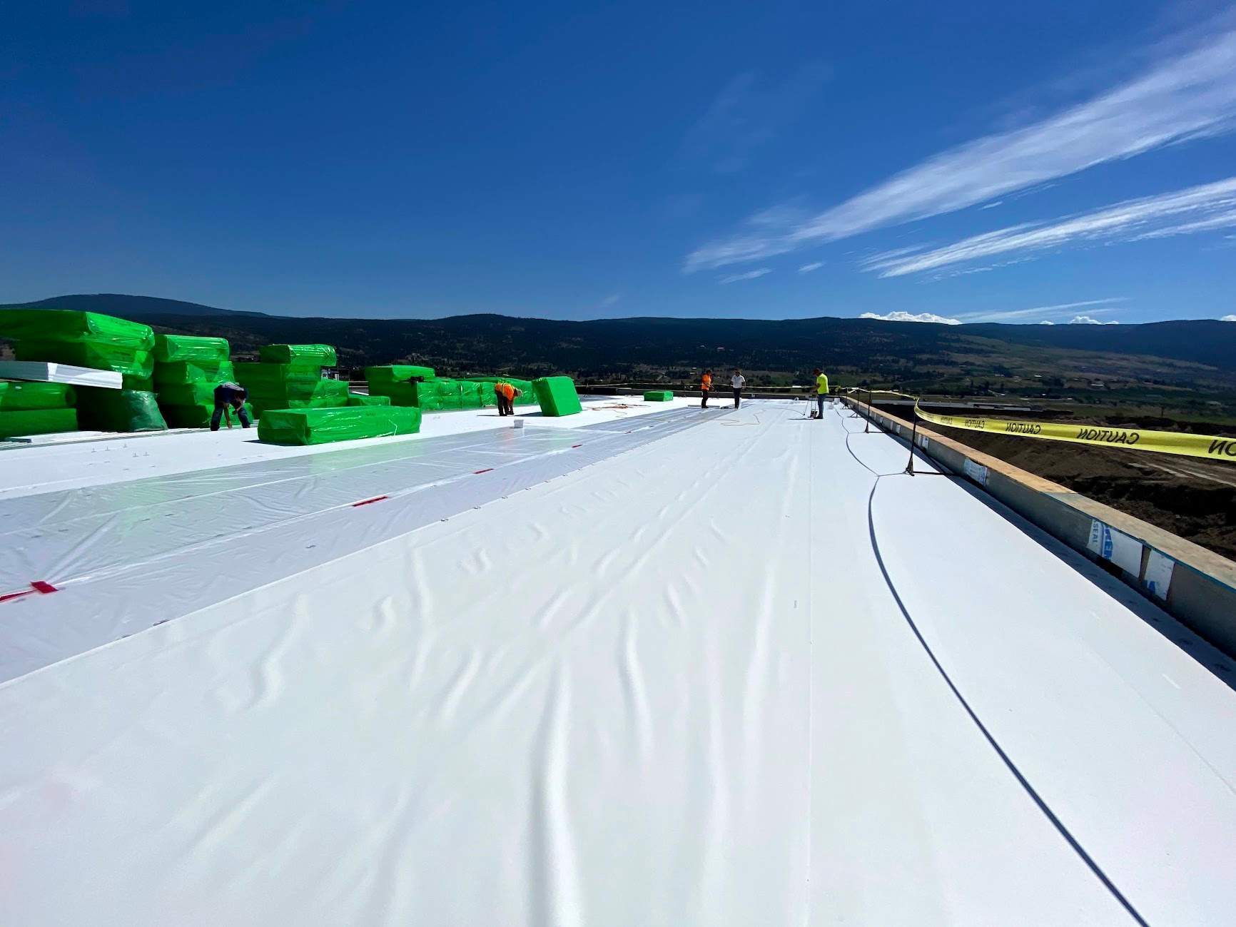Commercial Roofing Installation using Durolast by Top Notch Roofing Inc