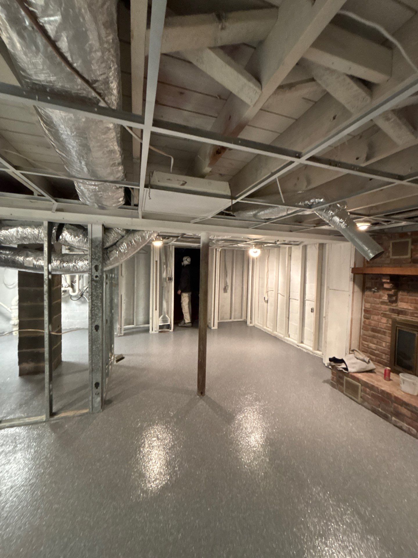 Basement Concrete Floor Coating with Penntek Flake System by Spectrum Painting, LLC