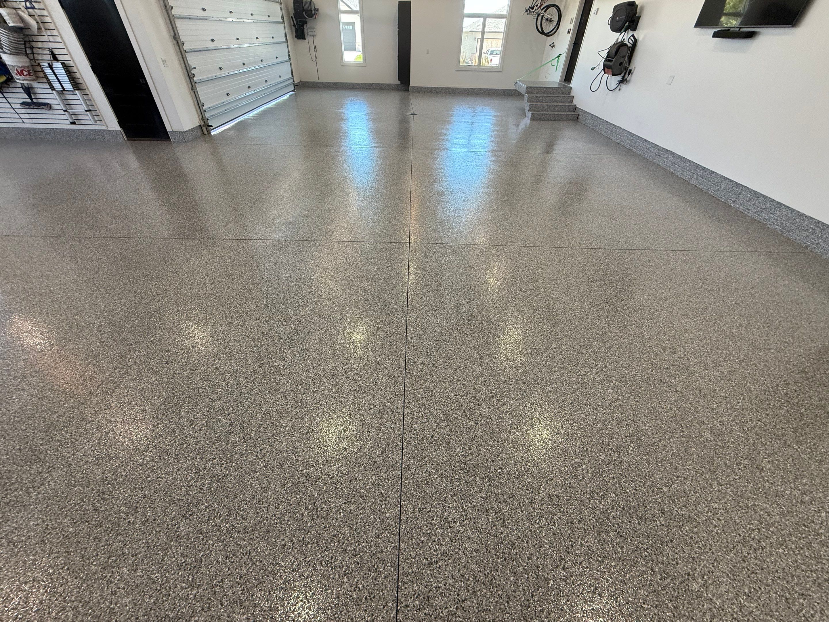 Gravel Flake Garage Floor Coating in Yankton by Select Painting, Coatings & Garage Cabinets