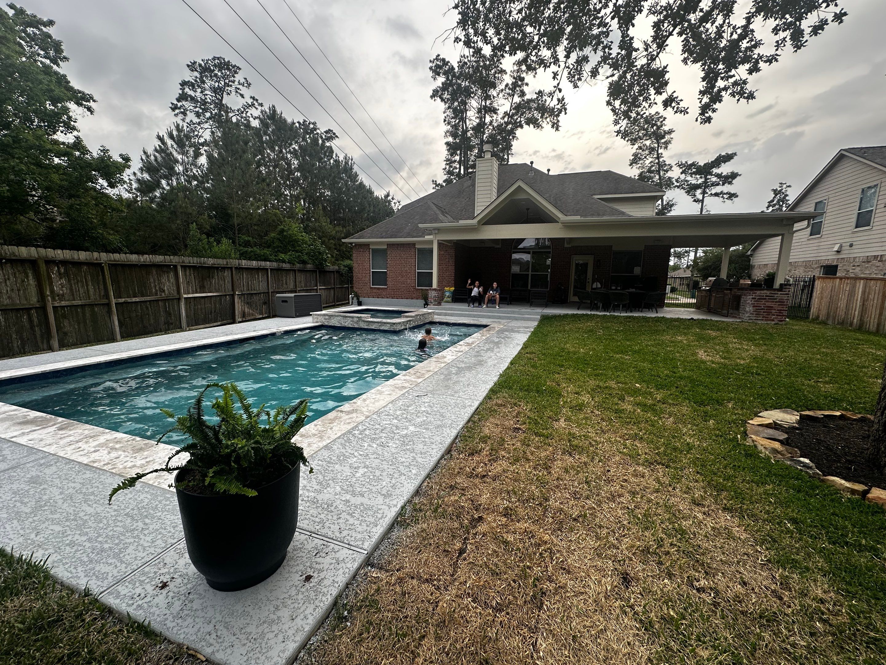 Pool, Patio Cover and Summer Kitchen in Creekside by SophAlx LLC