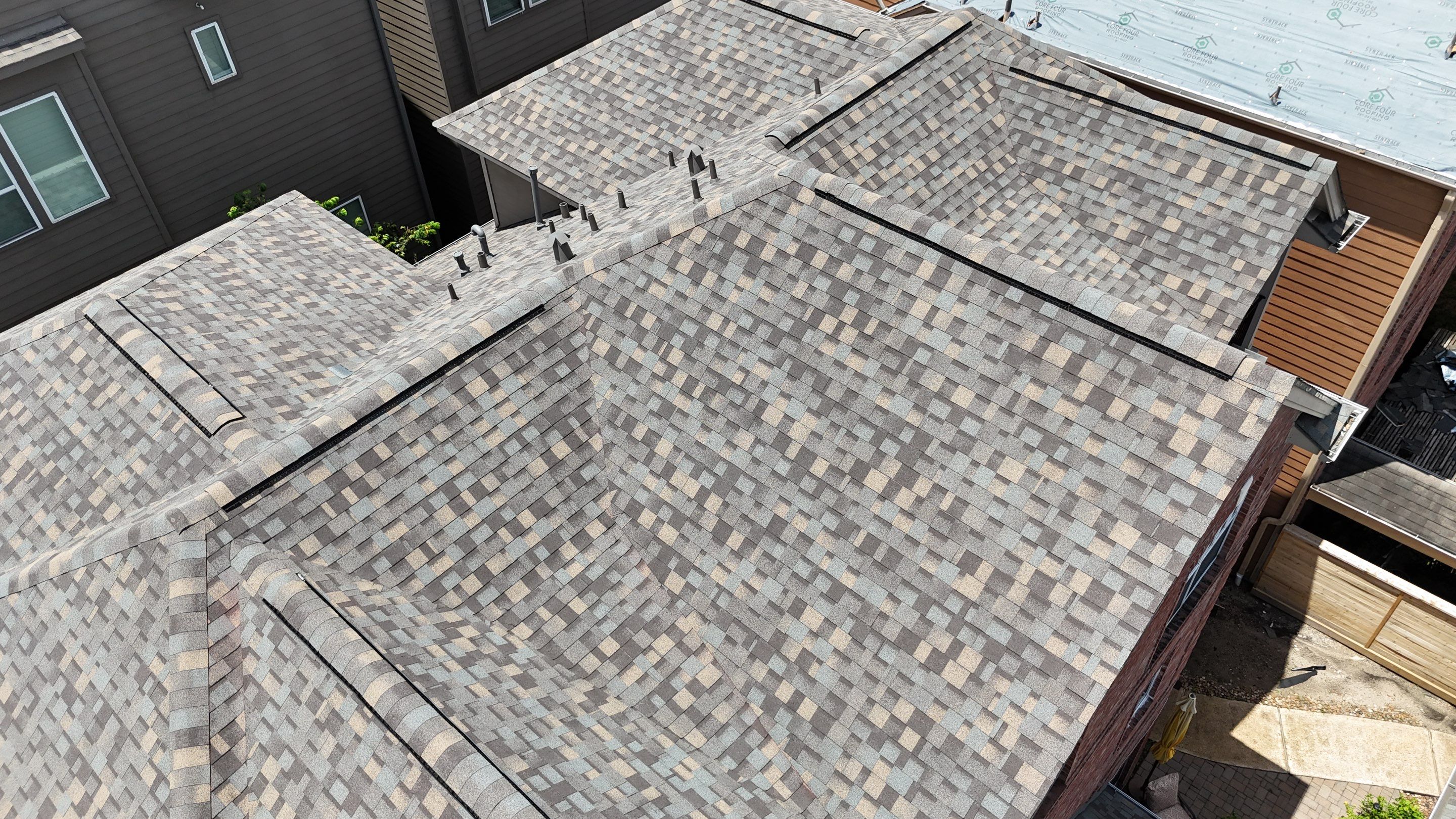 Residential Roofing Installation on a Highrise Duplex using IKO Dynasty by Core Four Roofing