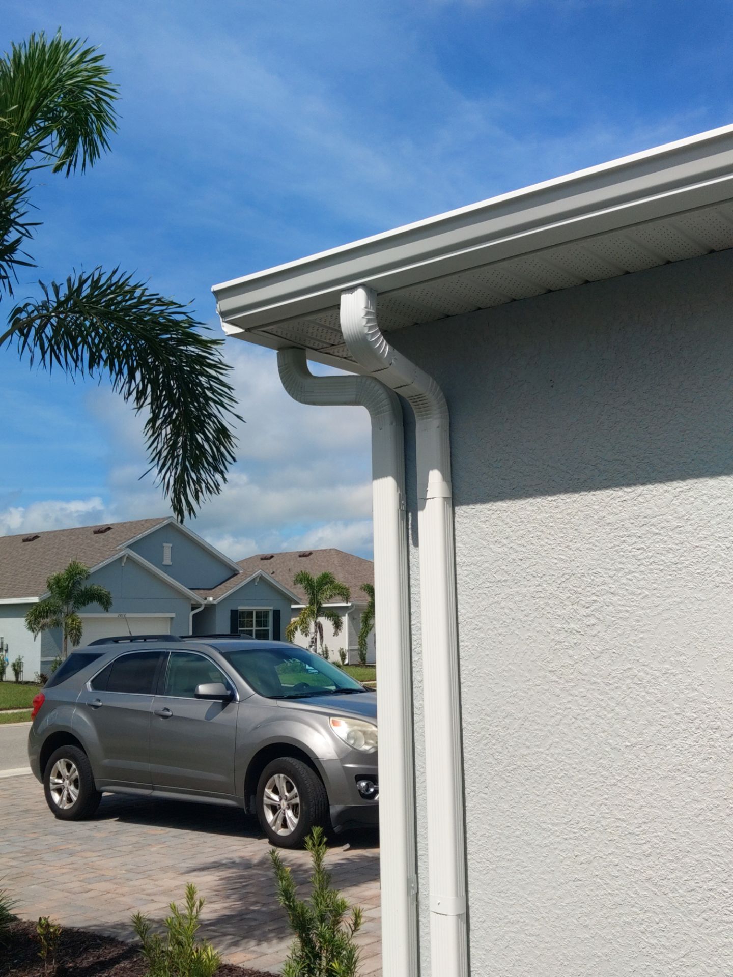 White Seamless Gutters for Beachfront Homes  by Gutter Professors