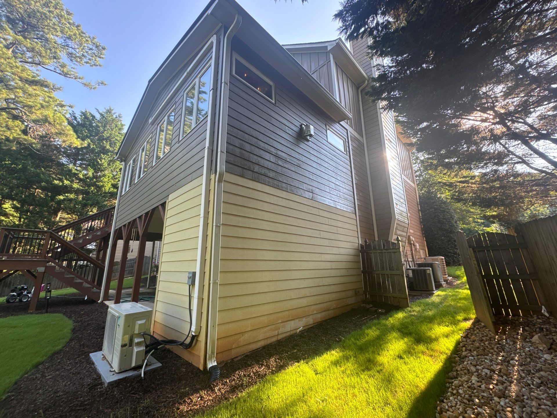 Exterior Modernization Featuring New Siding and Custom Wood Portico by Swift Home Renovations