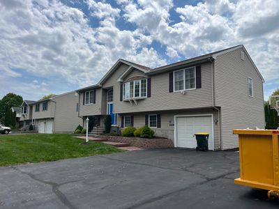 Transformation asphalt shingled roof by DiGiorgi