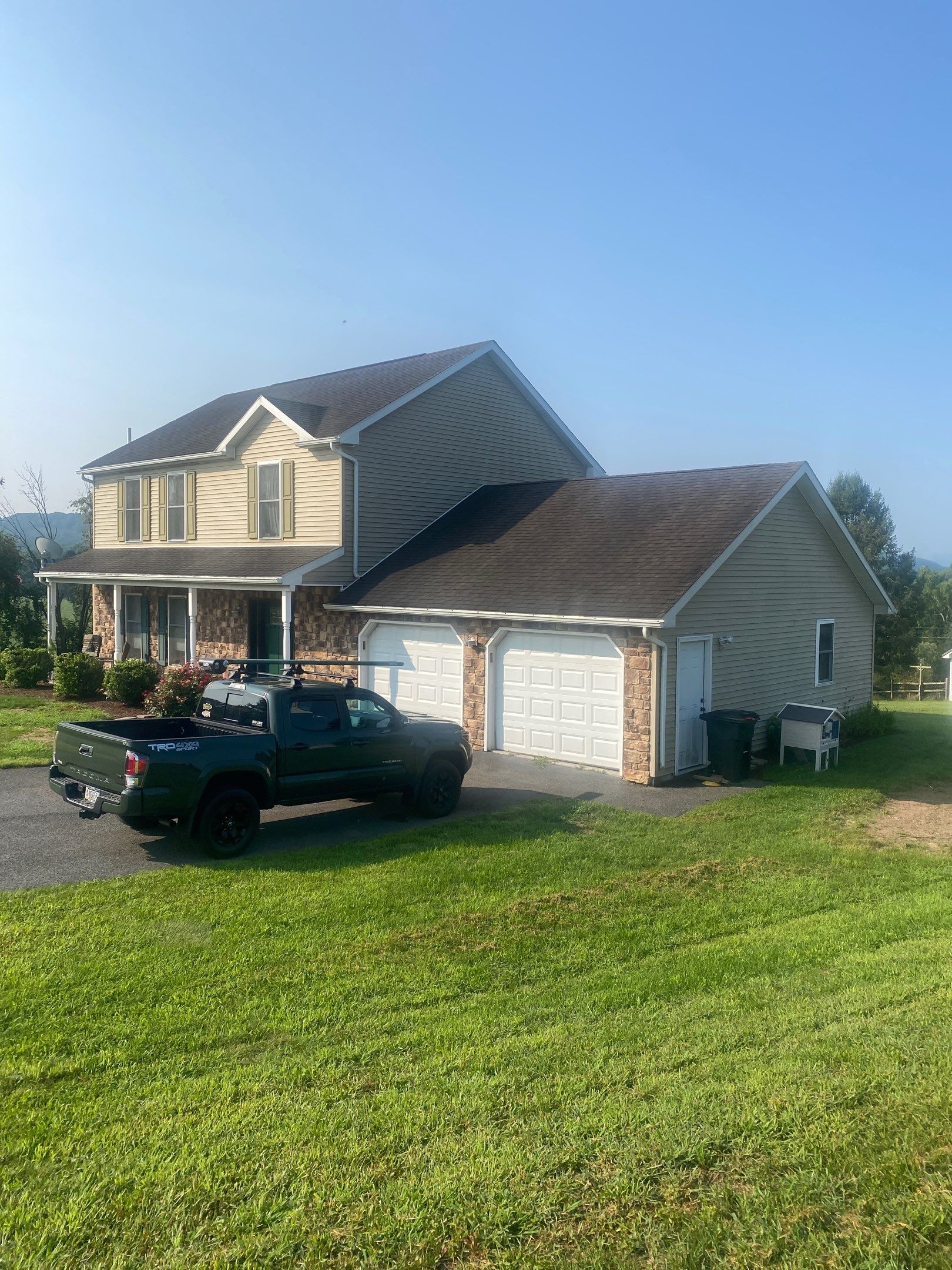 Reshingle and Entry Door by Esh Builders