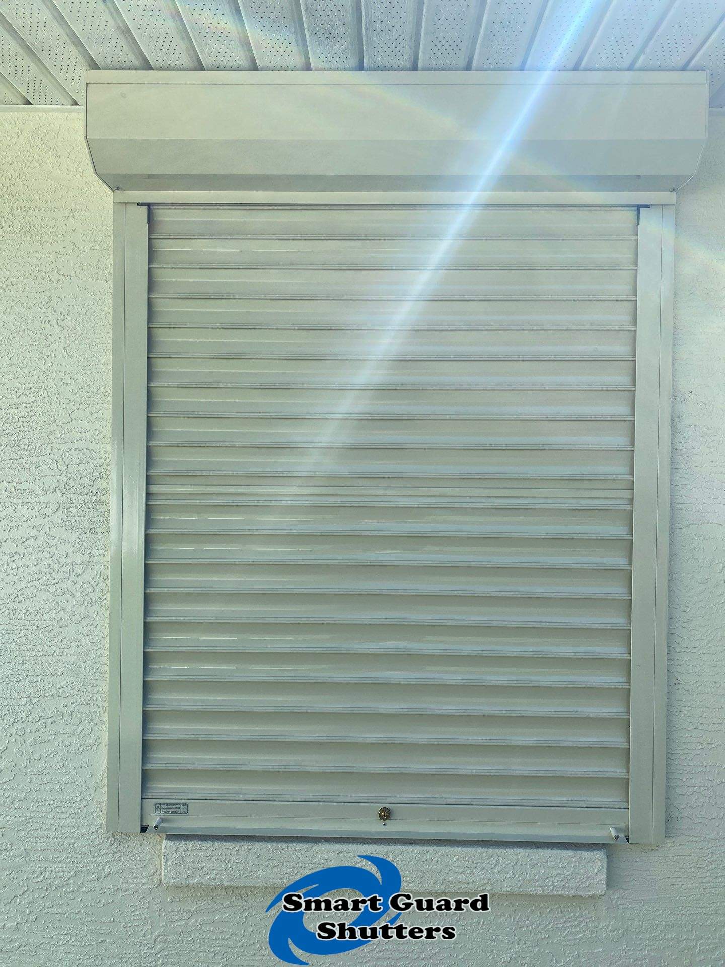 Rolling Shutters in Ivory by Smart Guard Shutters