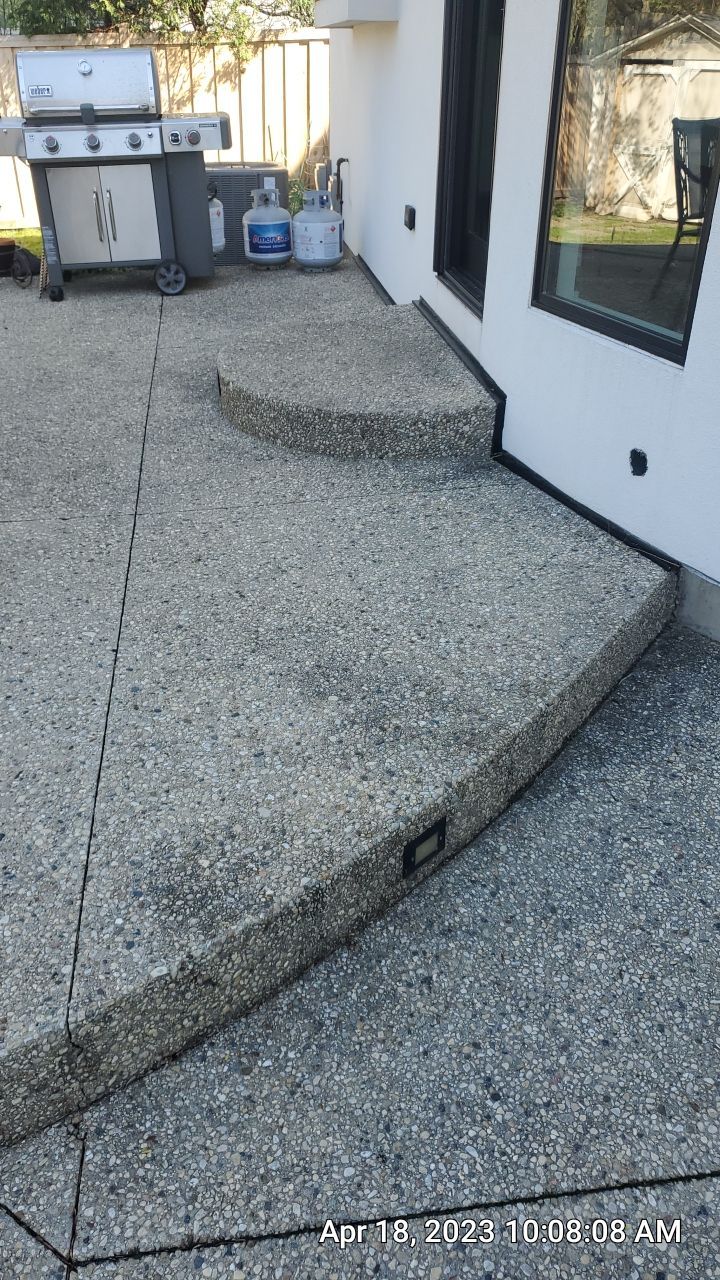 Aggregate concrete cleaning and sealing using Surebond SB-9000 by Northern Power Washing LLC.