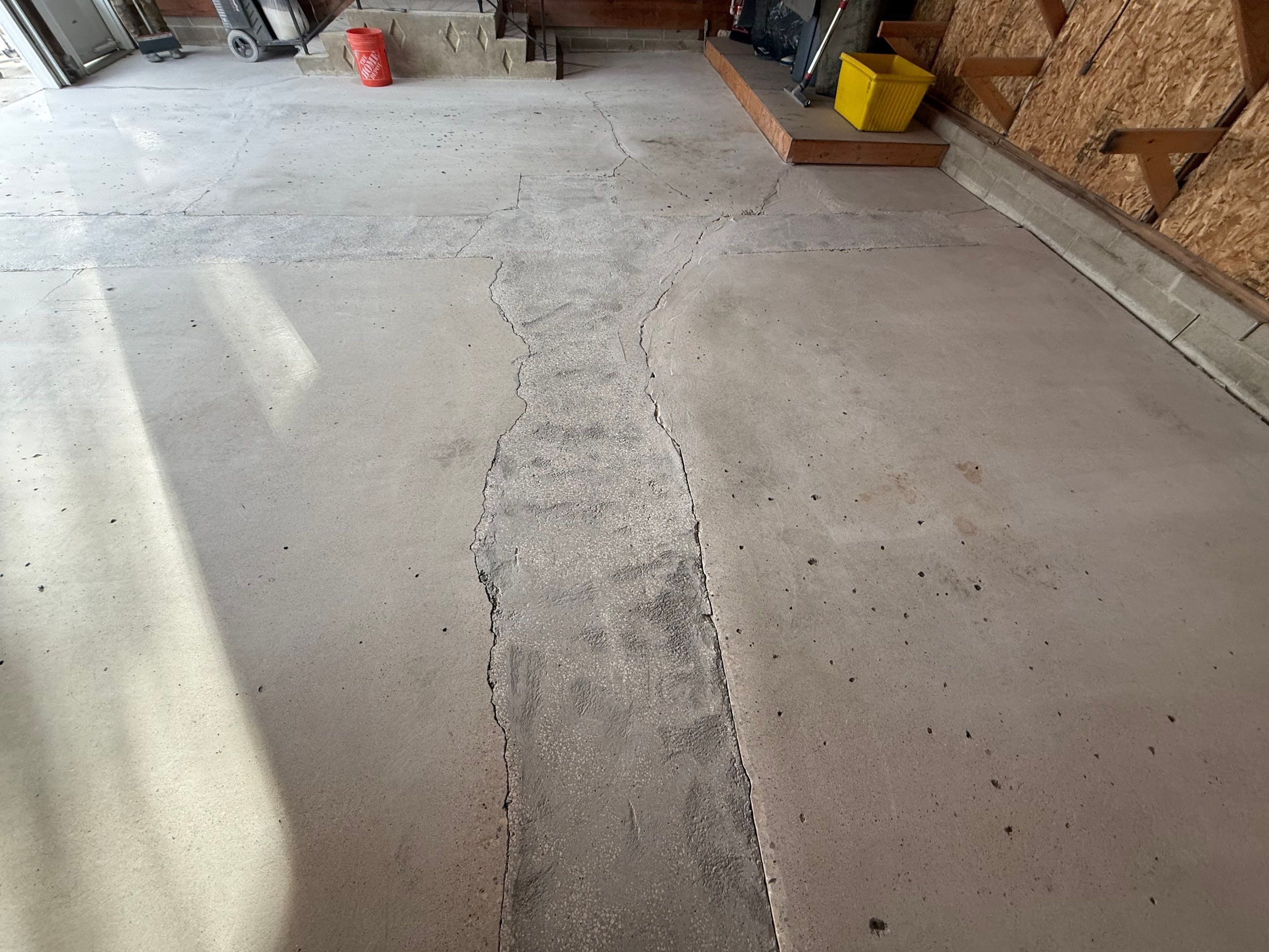 Multi-Colored Epoxy Garage Floor Coating and Concrete Stair Restoration by Select Painting, Coatings & Garage Cabinets