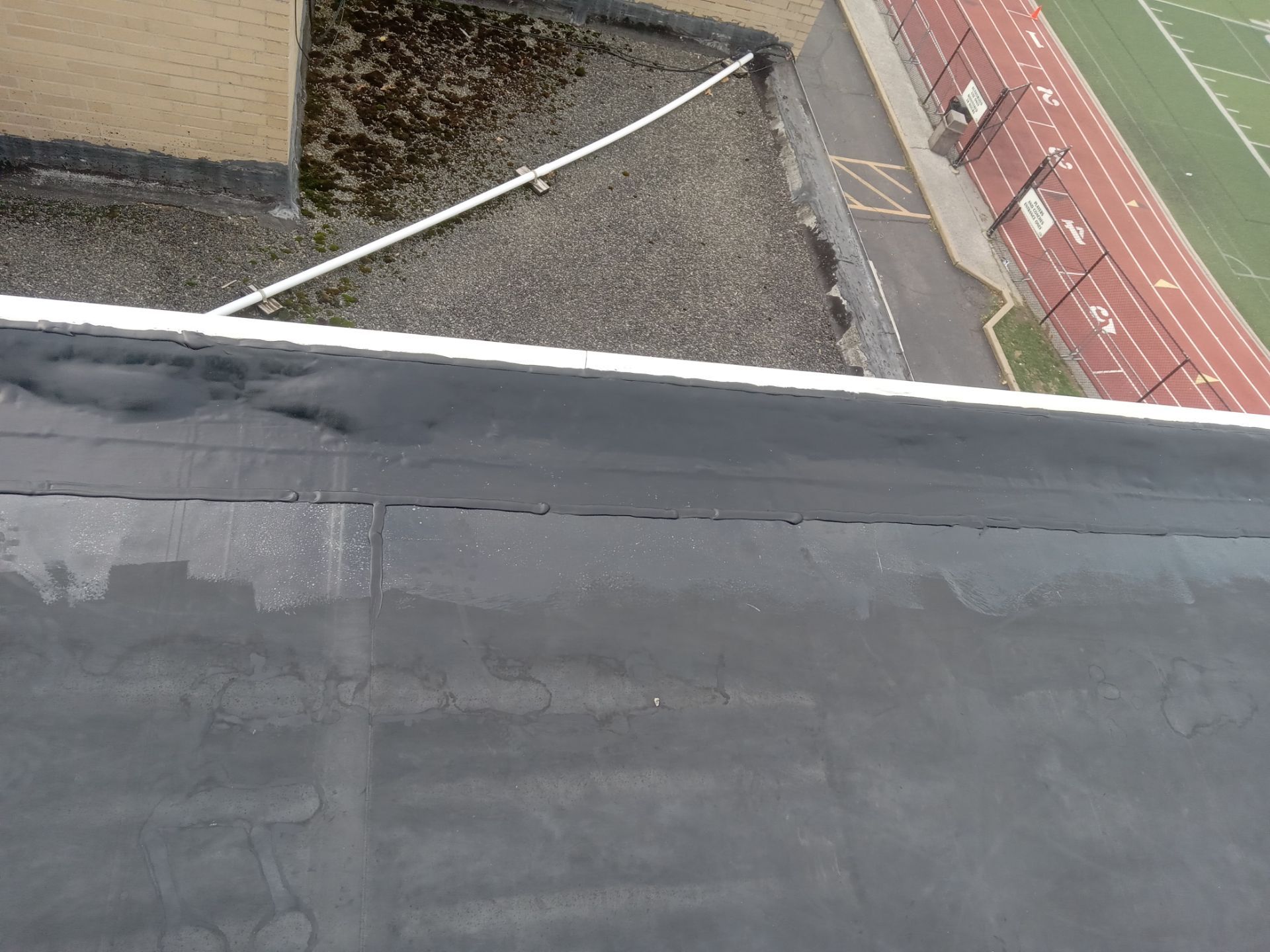 Commercial Roofing using Roof Replacement by Absolute Roofing and Construction