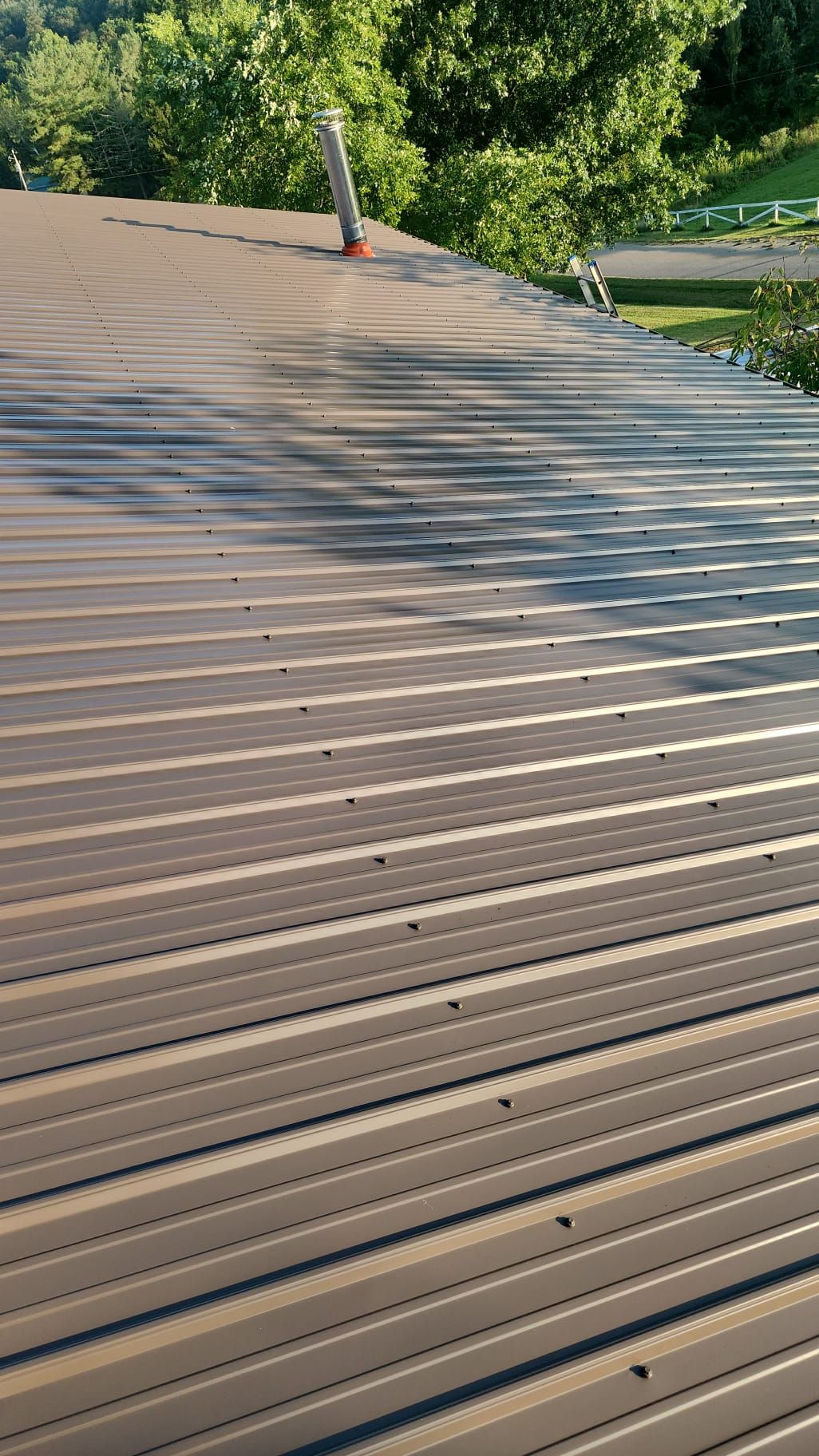 Residential Roofing Installation using Metal by Rainstoppers Roofing