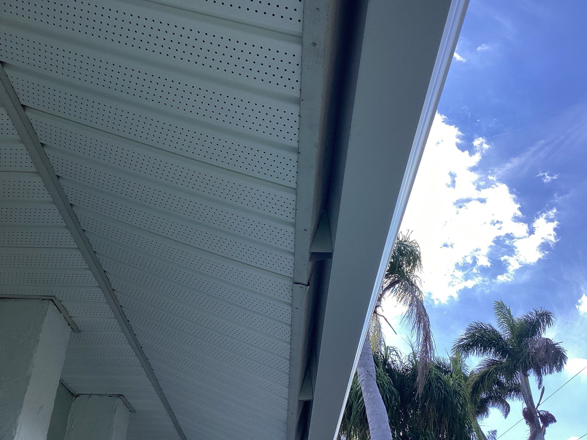 Downspout Installation using 3X4 Elbow Downspout in Cape Coral FL by Gutter Professors