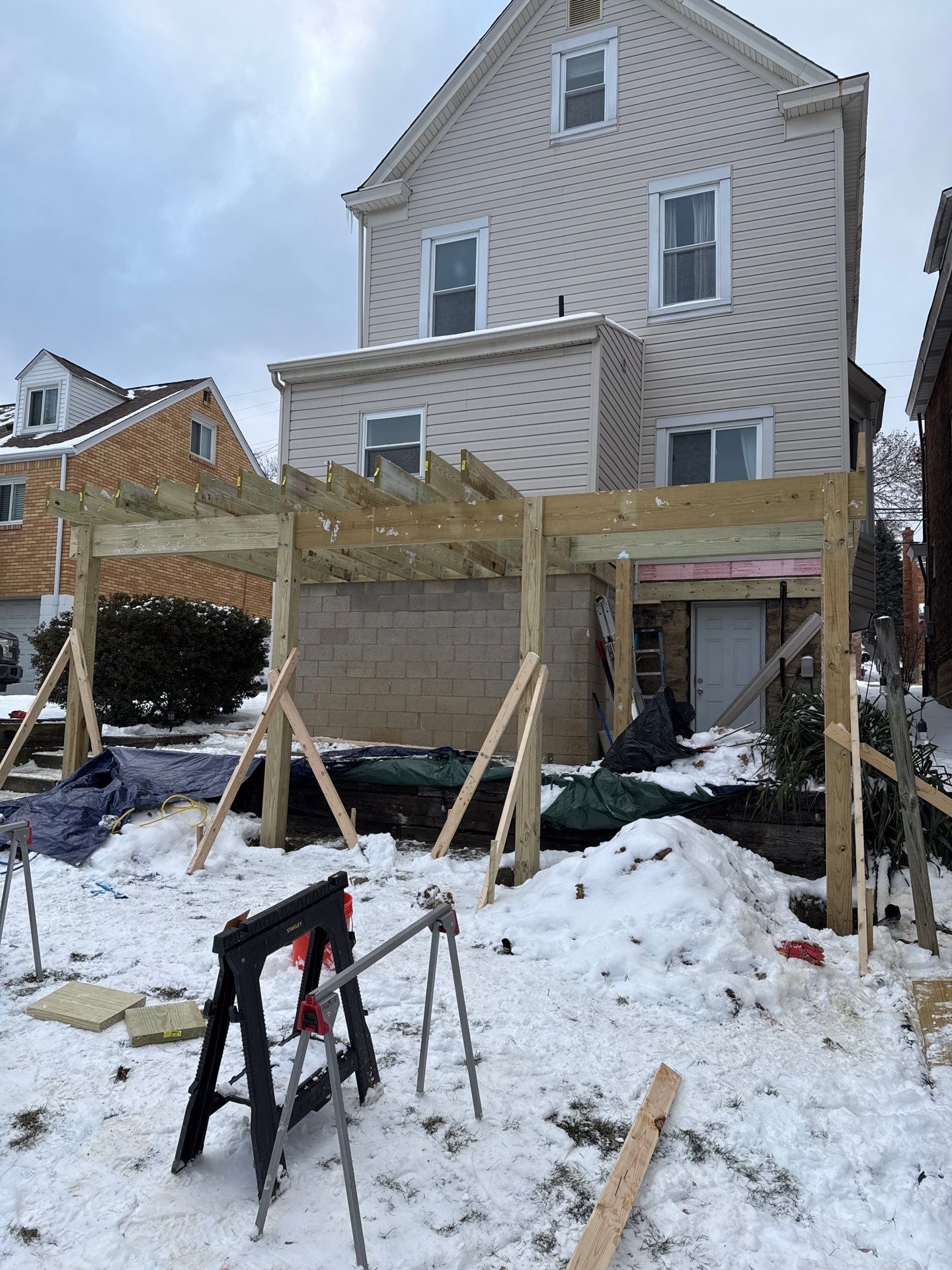 Deck and door by Cousins Roofing Siding & Decks