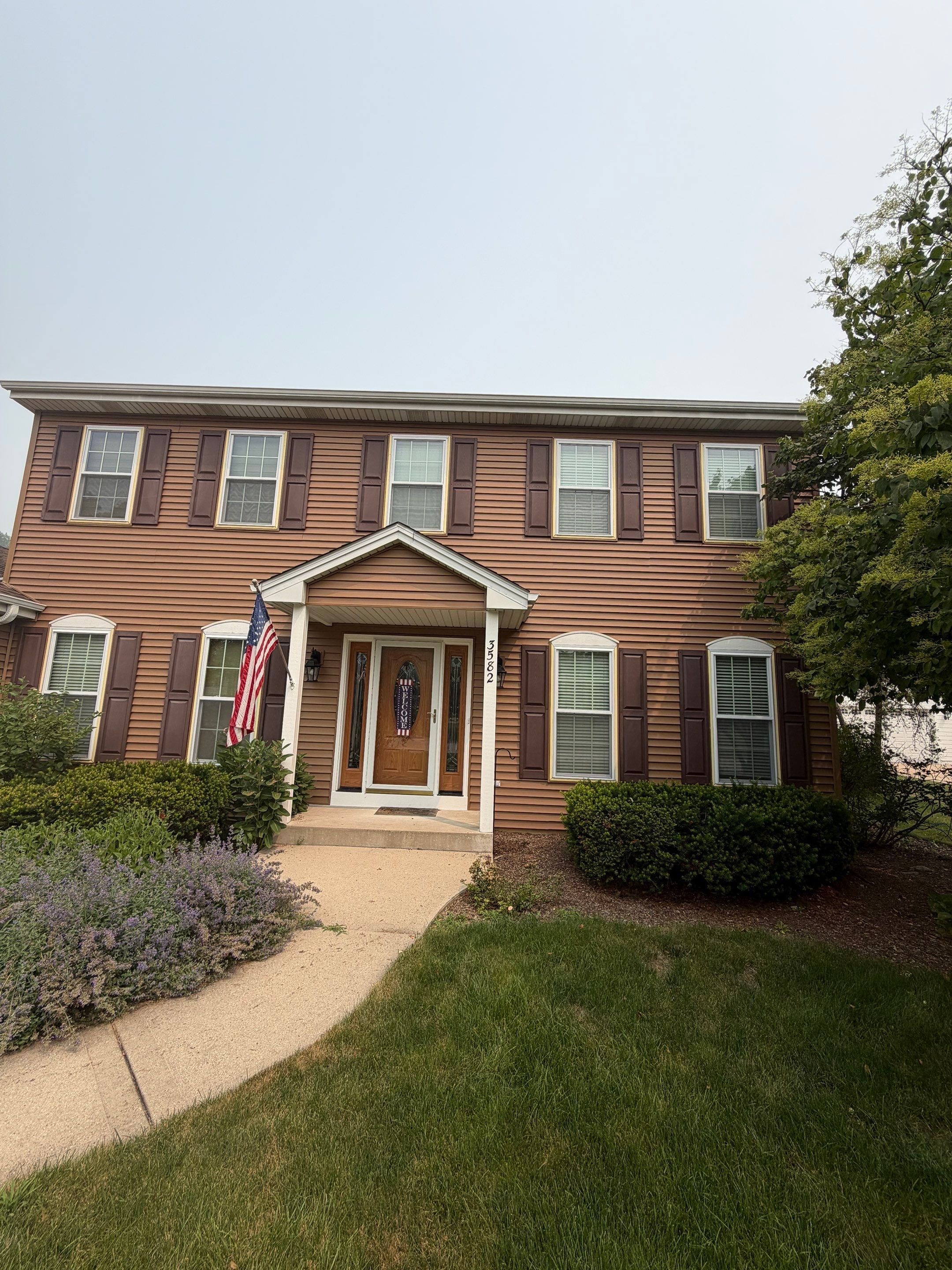Vinyl Siding Replacement and Shutter Installation in Pleasant Prairie, WI by OCS Contracting Services