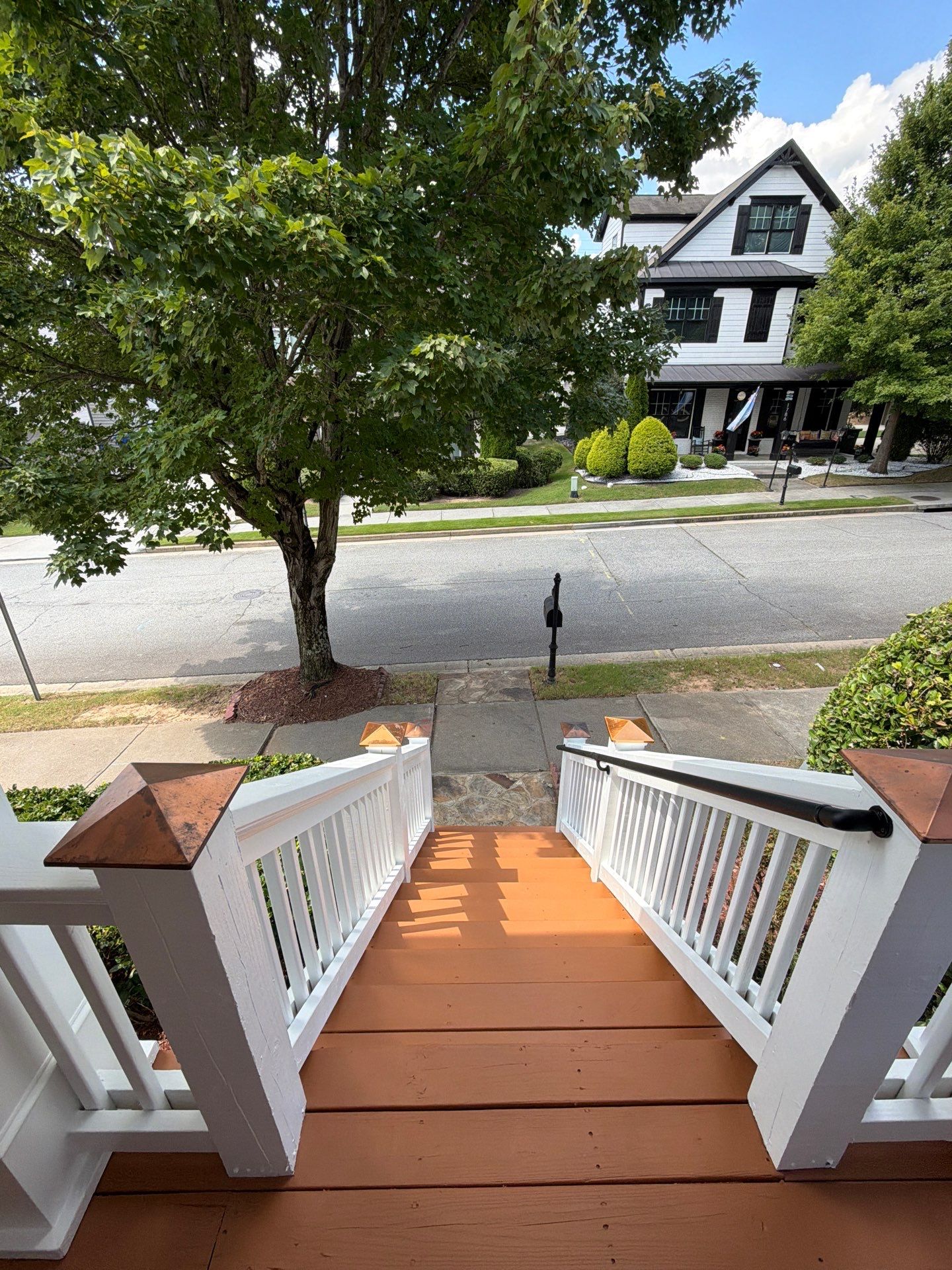 Atlanta Exterior Home Refresh with Blue Siding and Deck Staining by Swift Home Renovations 