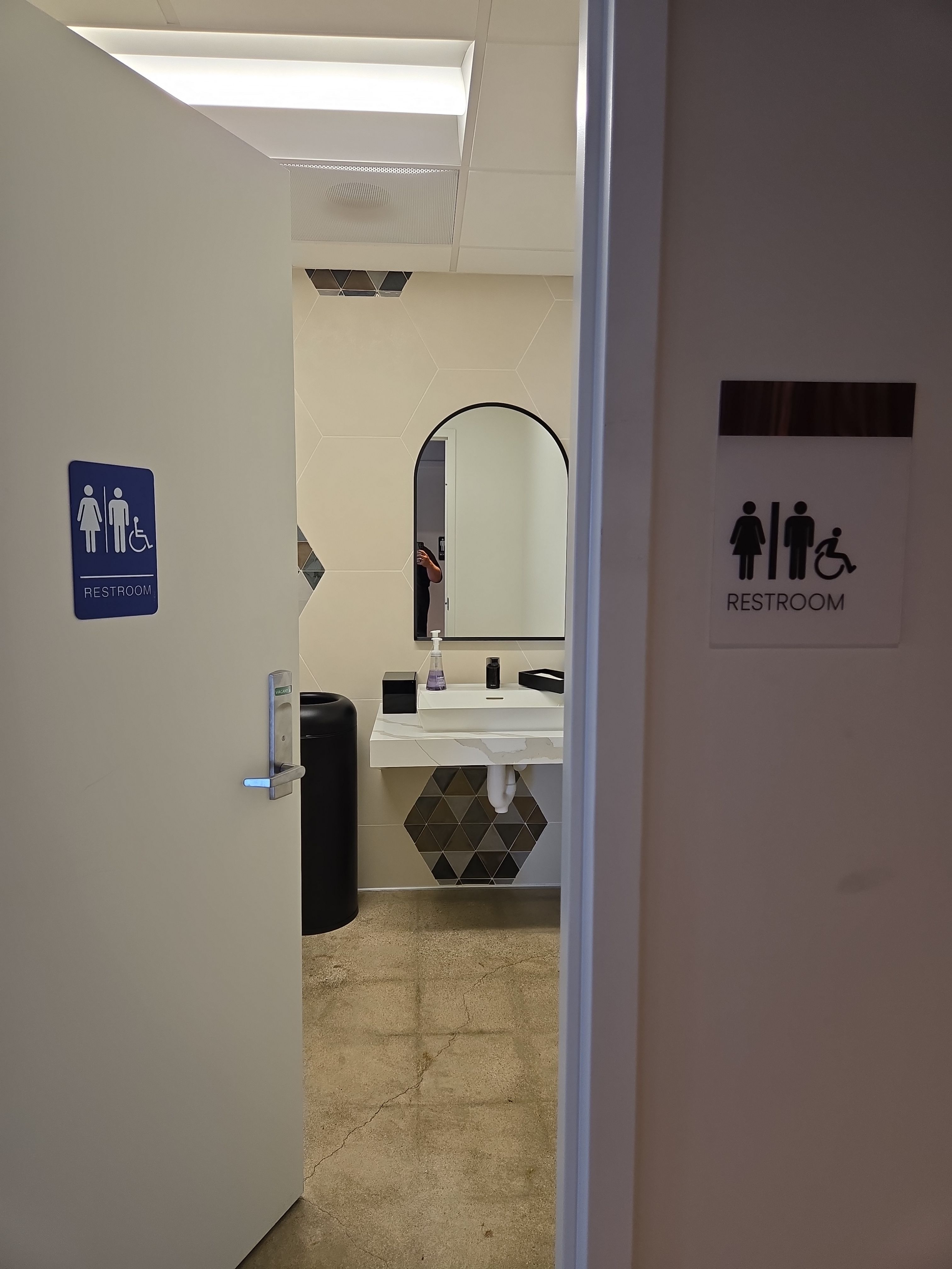 Interior ADA Restroom Signage with Wood Grain Accents by Hayes Design co