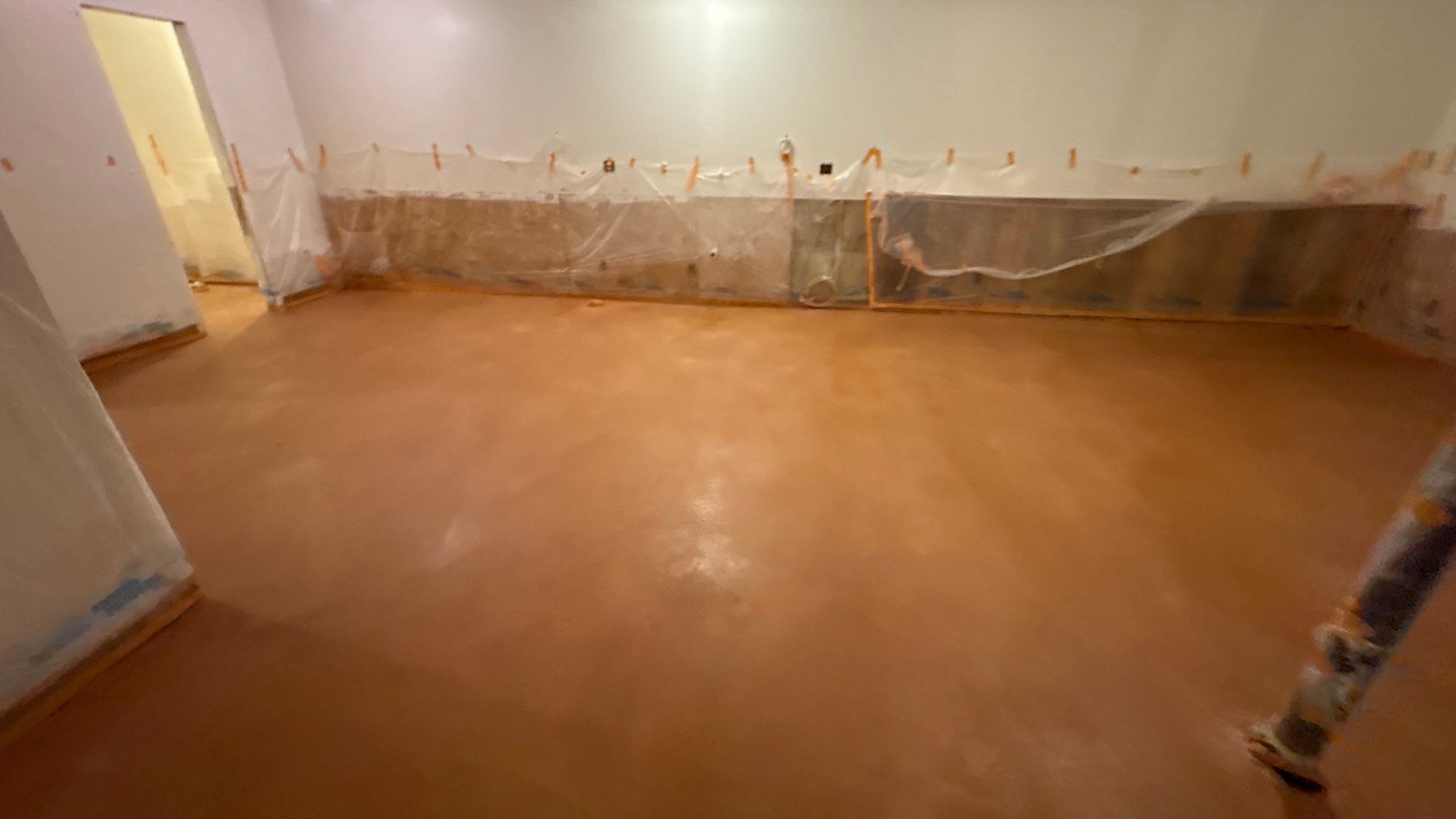 Basement Floor Remodel with Haven Reno KC by Big Red Decorative Concrete, LLC