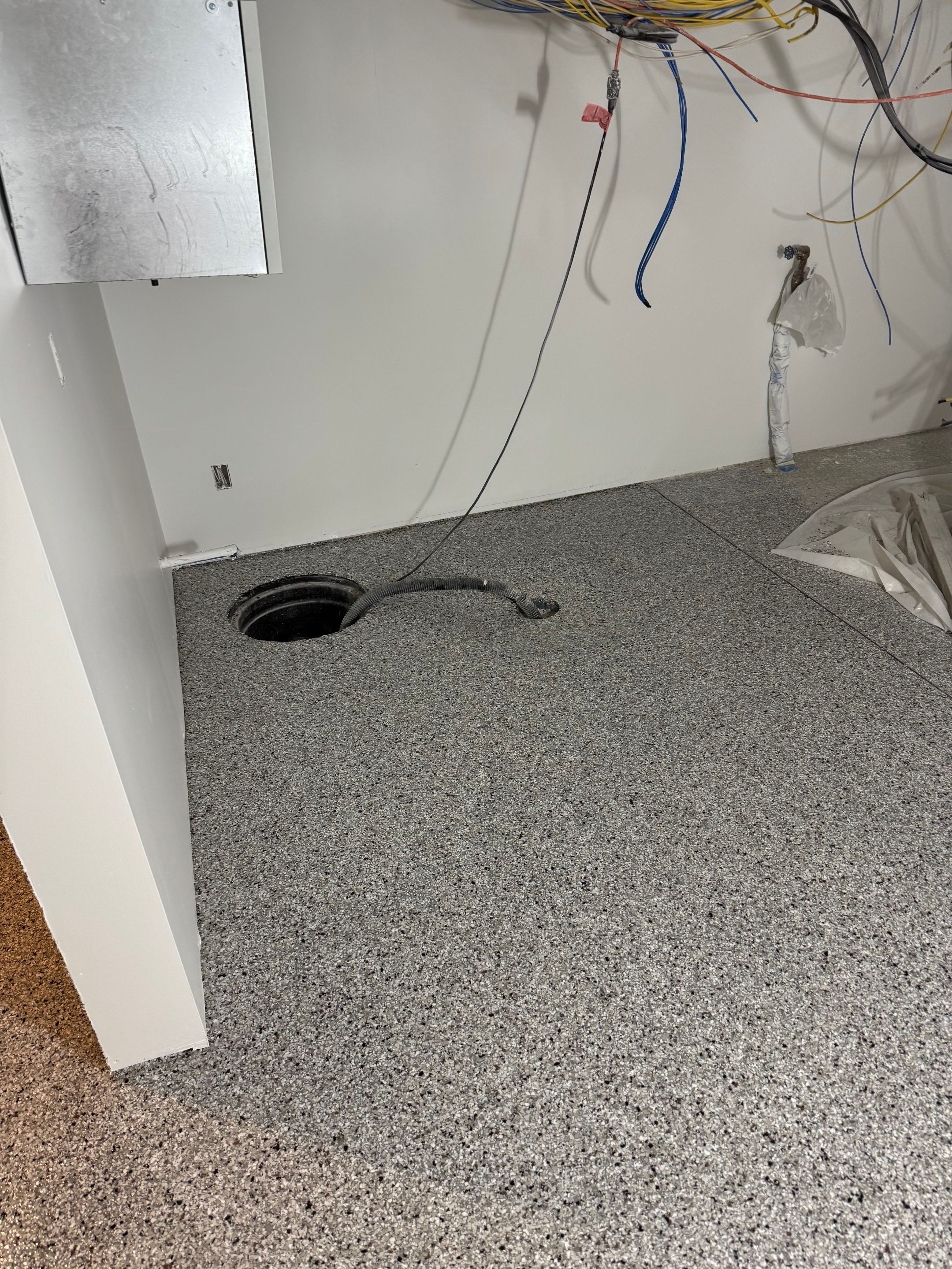 Custom Garage and Basement Epoxy Floor Coating in Menno by Select Painting, Coatings & Garage Cabinets