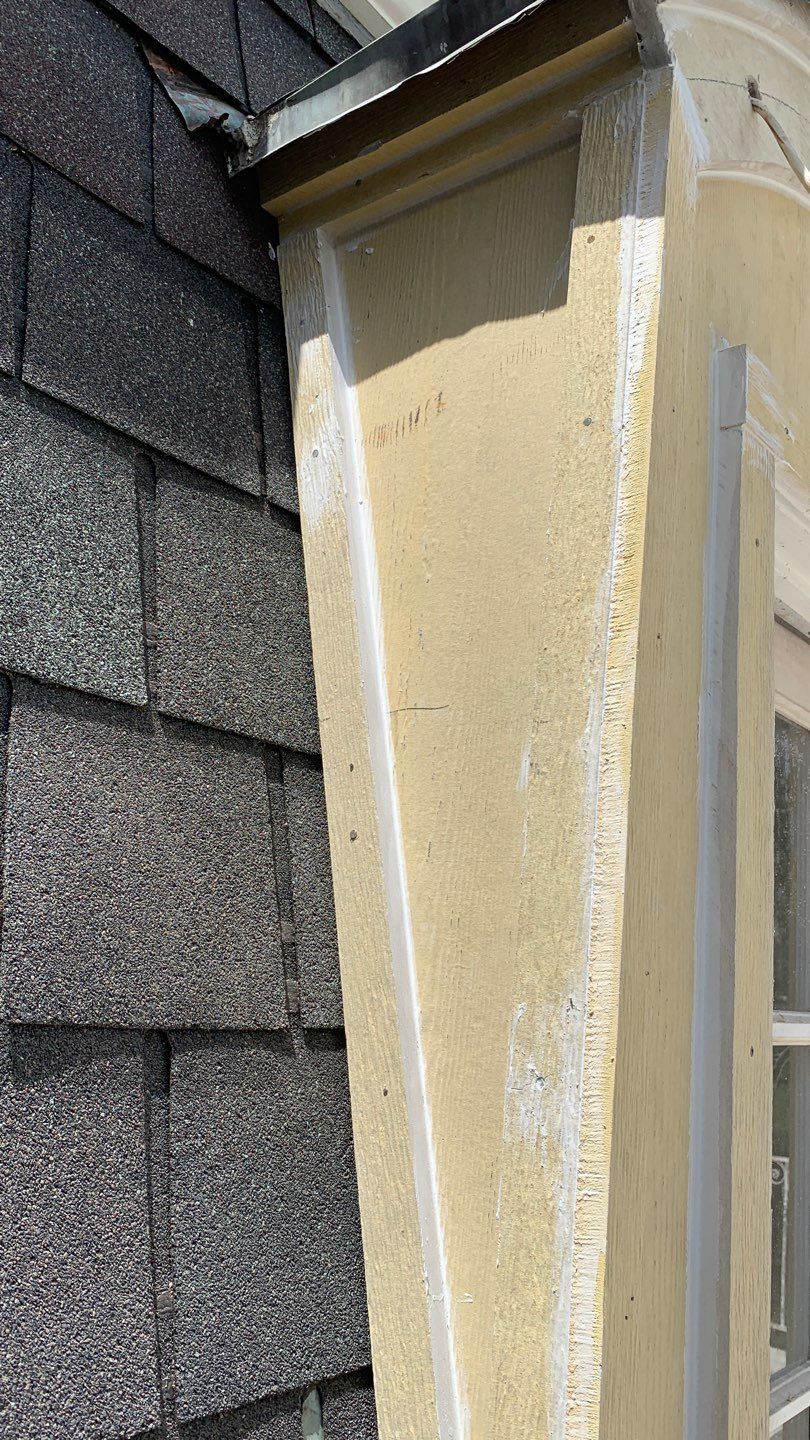 Mansard Charm by Bayfront Roofing and Construction