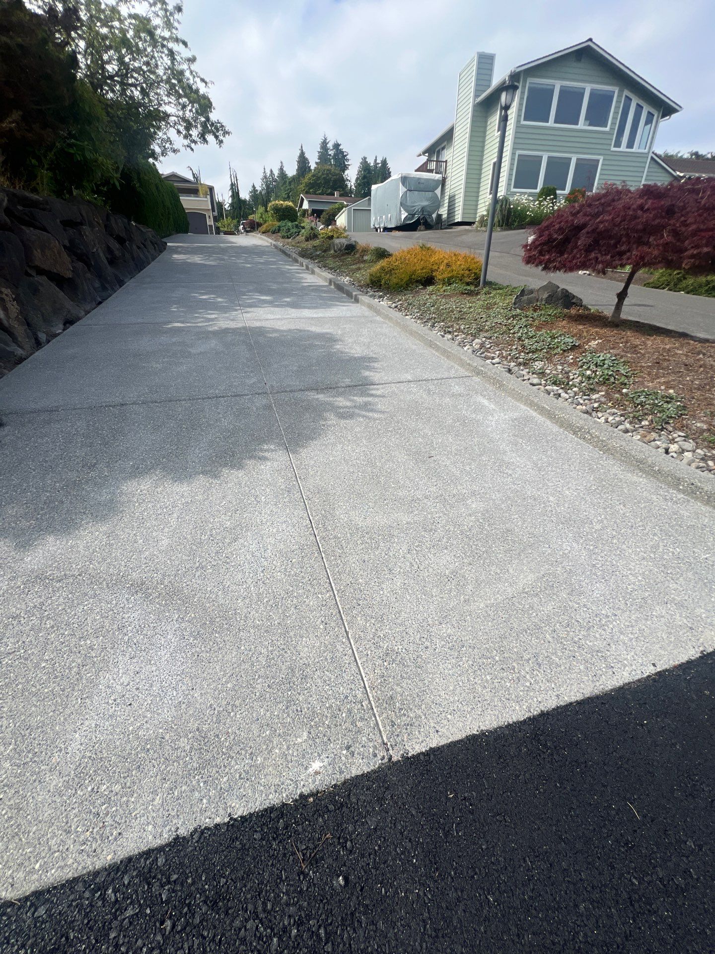 Concrete Driveway Makeover w/ Asphalt Patch | Everett  by Jireh Asphalt & Concrete Inc 