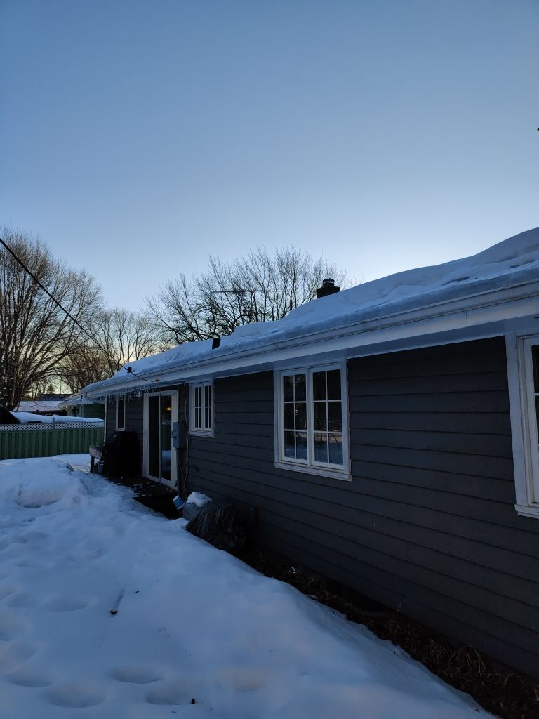 Steaming and Installing New Covers and Heating Cable by Next Level Seamless Gutters / Exteriors Inc.