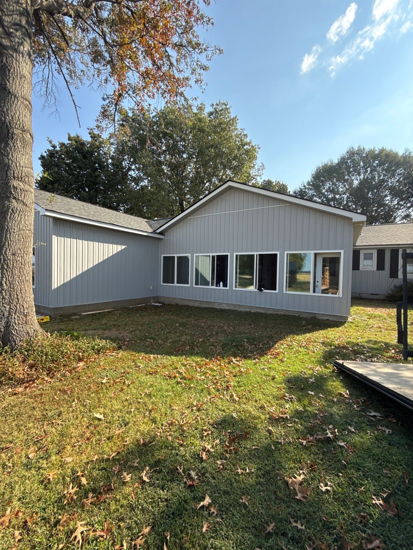 Sunroom and Garage Addition by Skilled Construction LLC