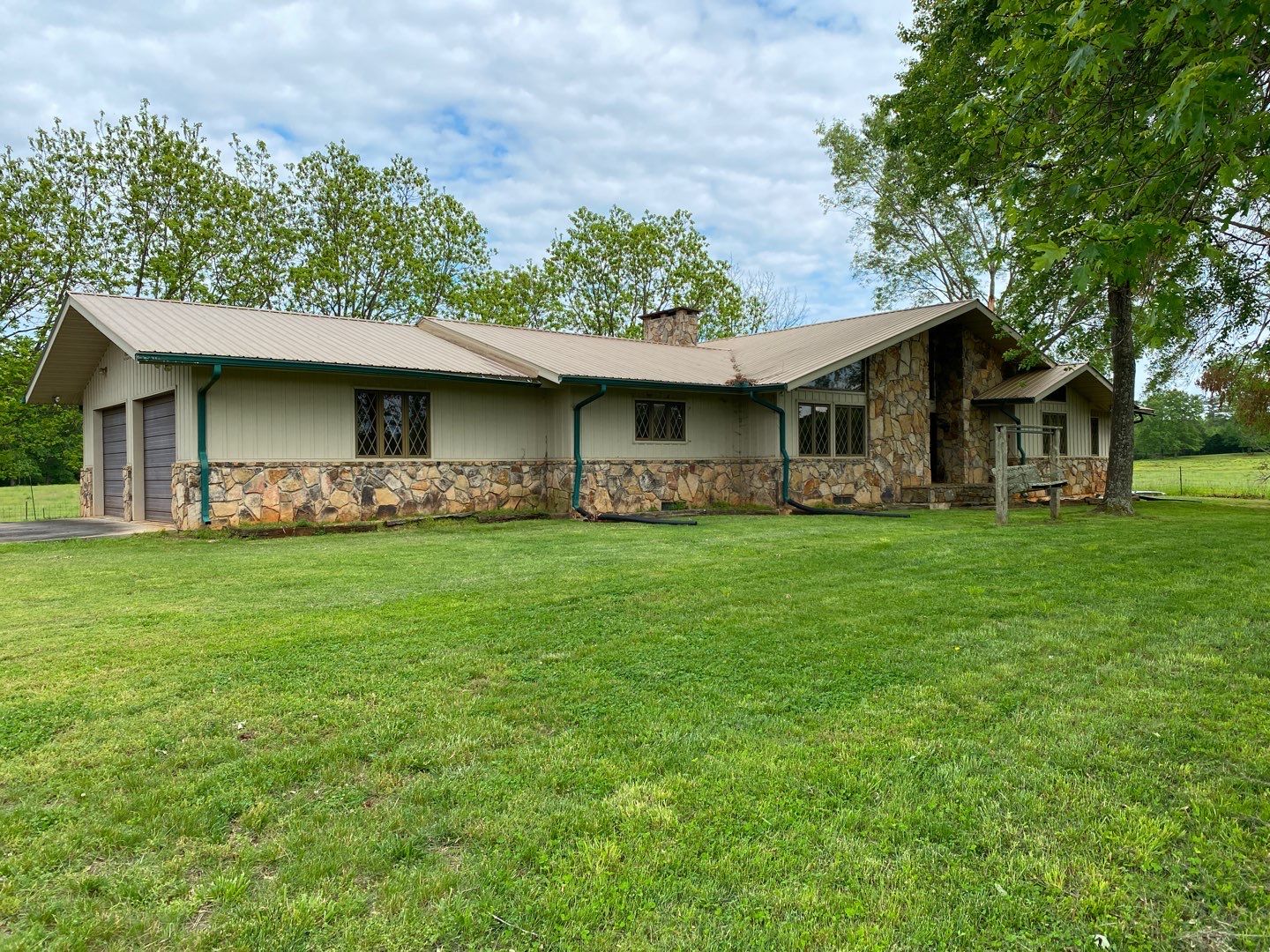 Green Metal Roof by Aultman Roofing